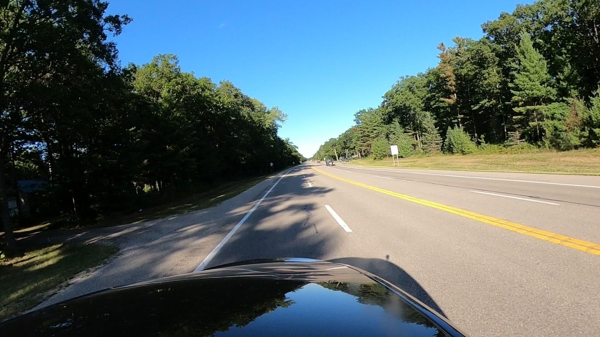 Street view near Woodland Beach Cottages, Au Sable — © treestryder (CC BY-SA · Mapillary)