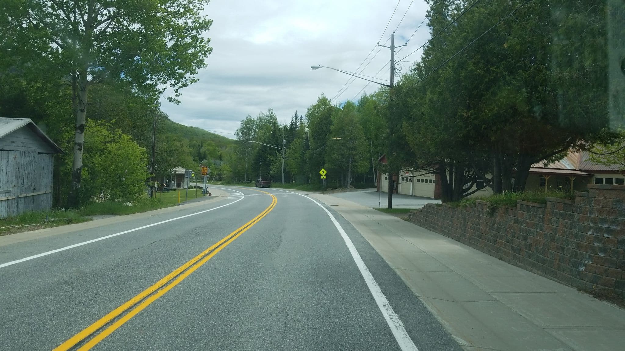 Street view near Blue Mt. Lake Inn, Tupper Lake — © jbthemilker (CC BY-SA · Mapillary)