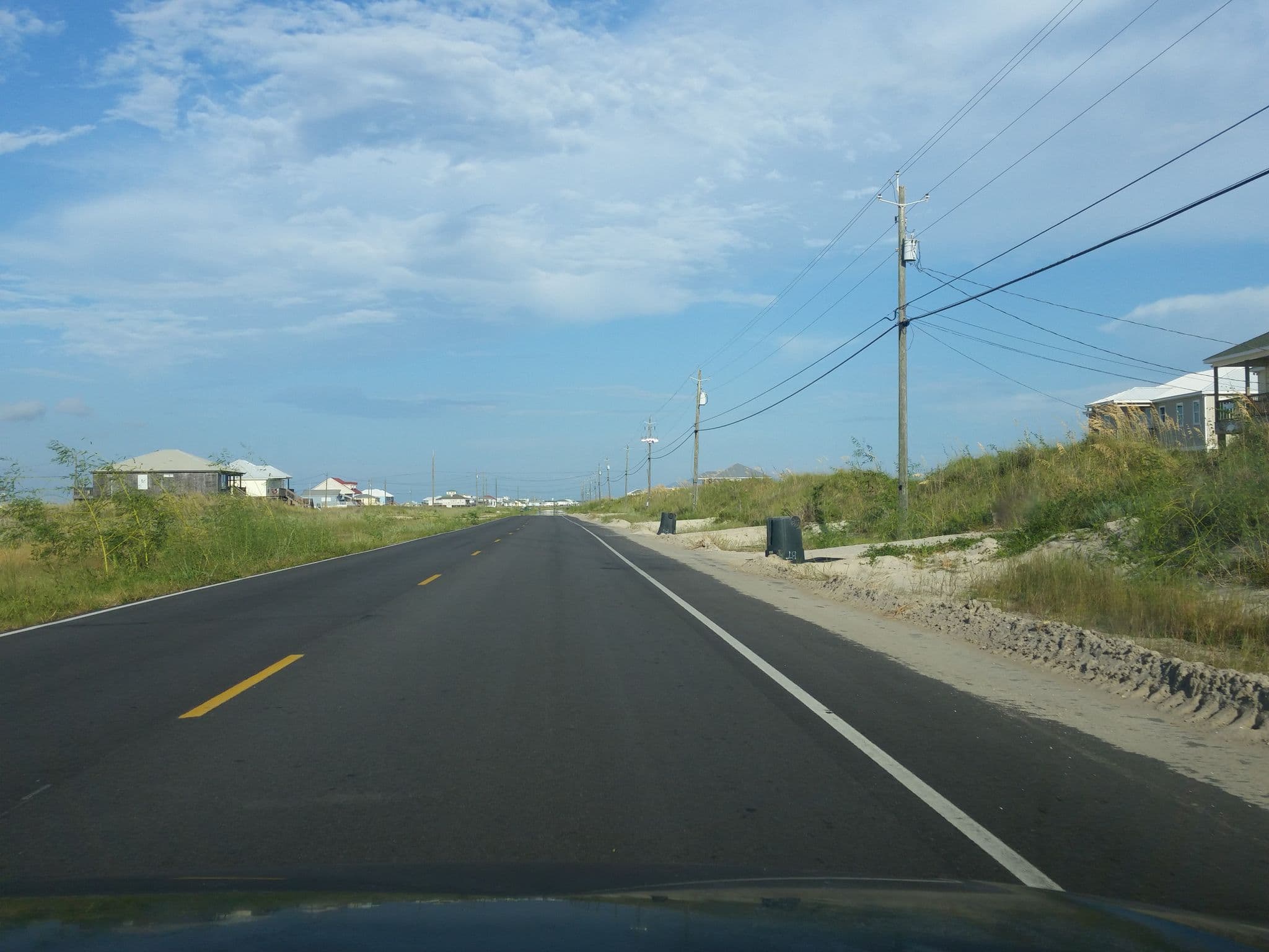 Street view near Grace Like Rain Beach House, Dauphin Island — © caboosey (CC BY-SA · Mapillary)