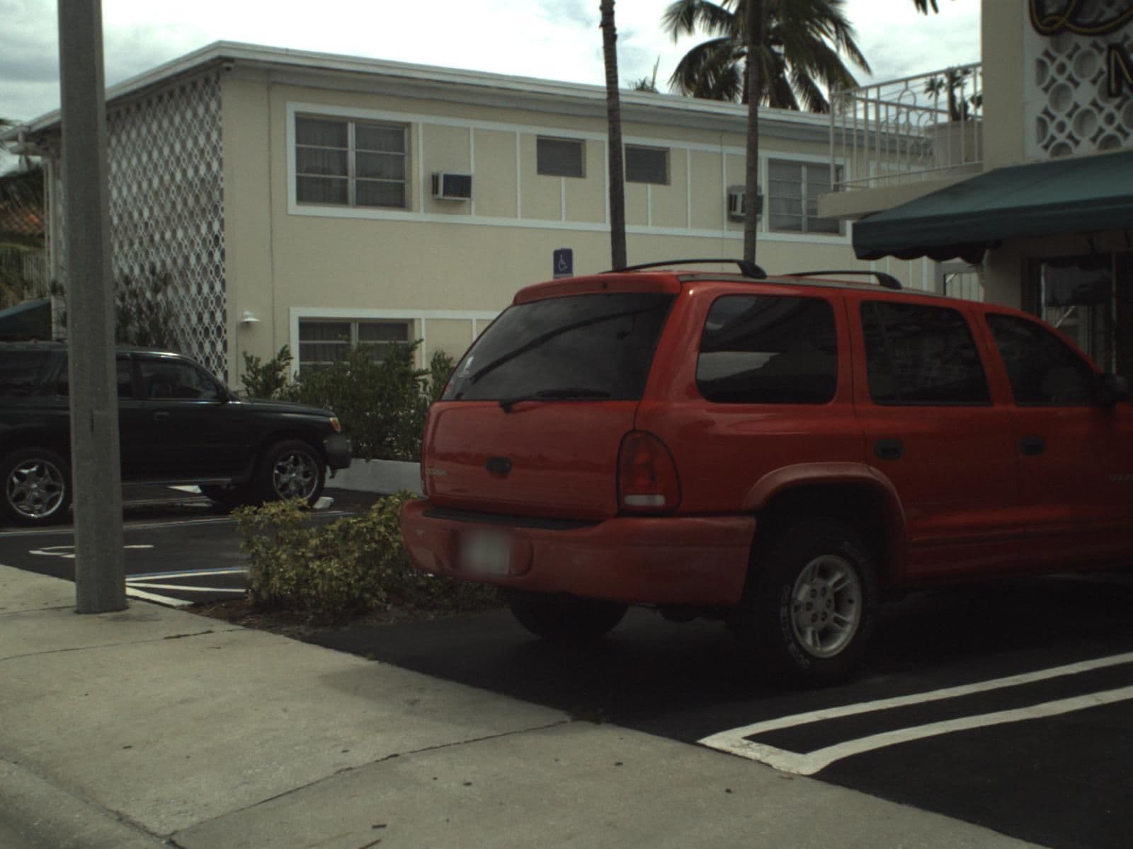 Street view near Queen Motor Lodge, Mangonia Park — © fdot_vl (CC BY-SA · Mapillary)