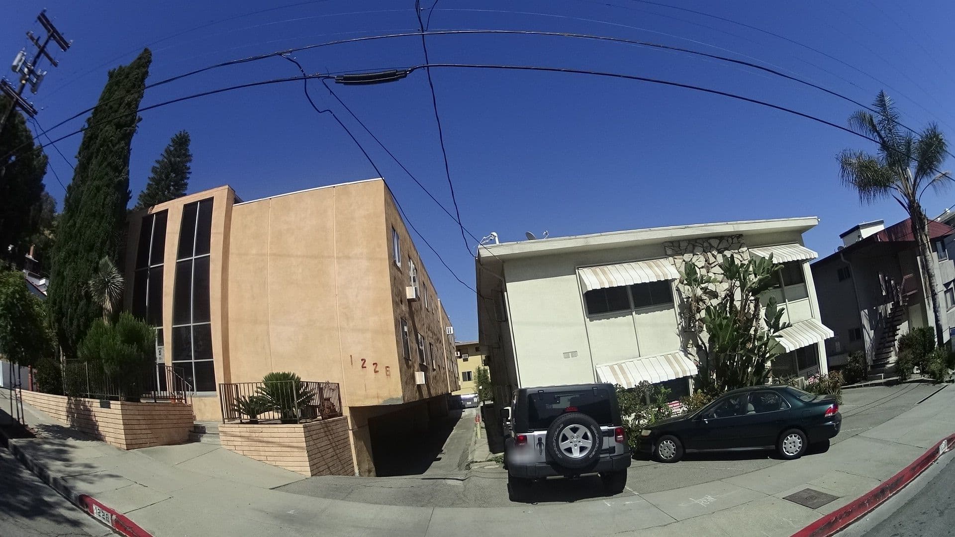 Street view near Larrabee Airbnb, Beverly Hills — © mly_la (CC BY-SA · Mapillary)