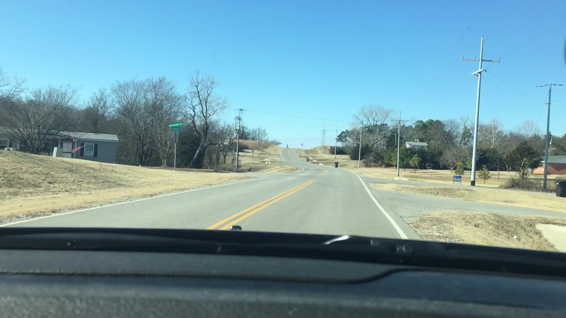 Street view near Arbuckle Family Lodges, Wynnewood — © lvl5 (CC BY-SA · Mapillary)