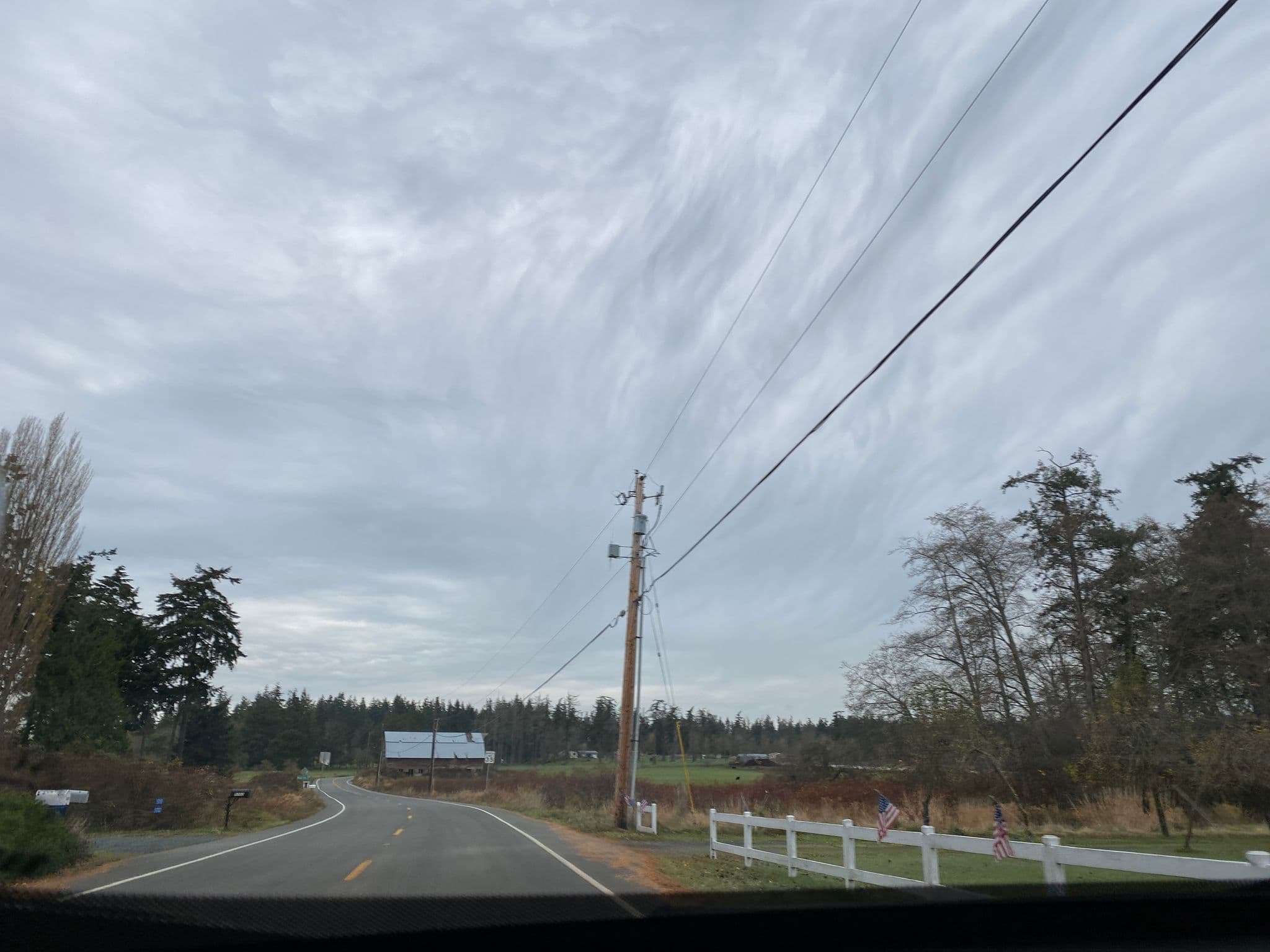Street view near Muntiny Bay Cottage, Hansville — © cmiles (CC BY-SA · Mapillary)