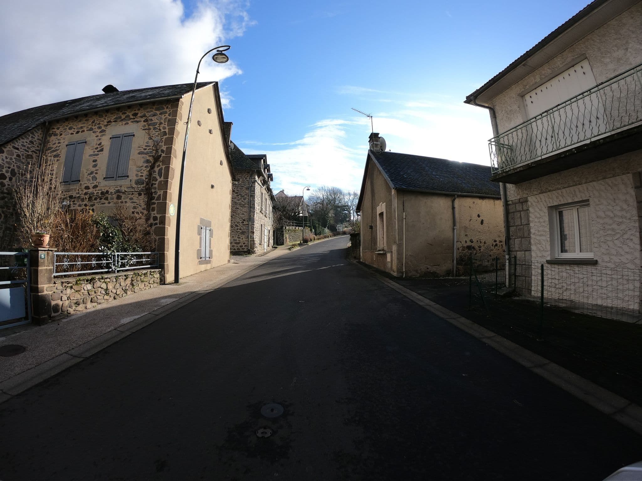 Street view near Gite des Abeilles, Ydes — © joostjakob (CC BY-SA · Mapillary)