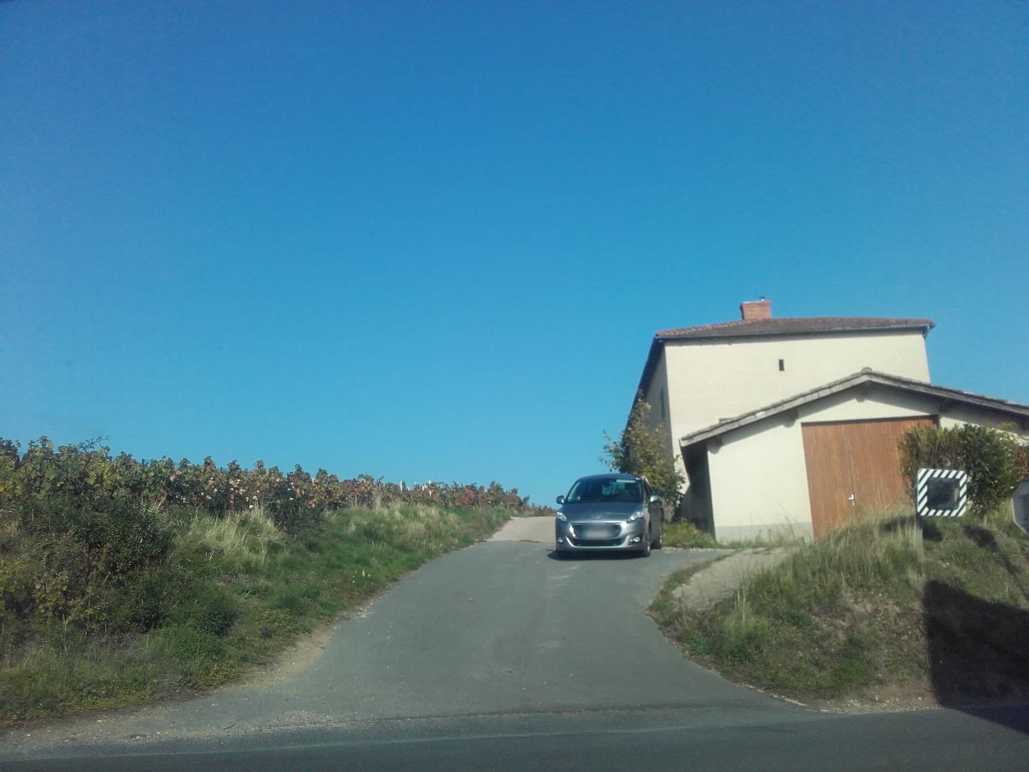 Street view near Domaine du Côteau des Lys, Fleurie — © alexcorioze (CC BY-SA · Mapillary)