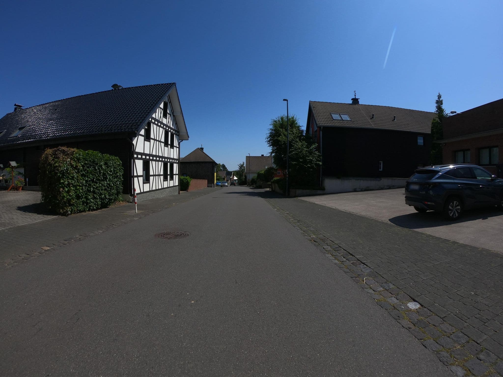 Street view near Ferienhaus Wildblick, Schleiden — © joostjakob (CC BY-SA · Mapillary)