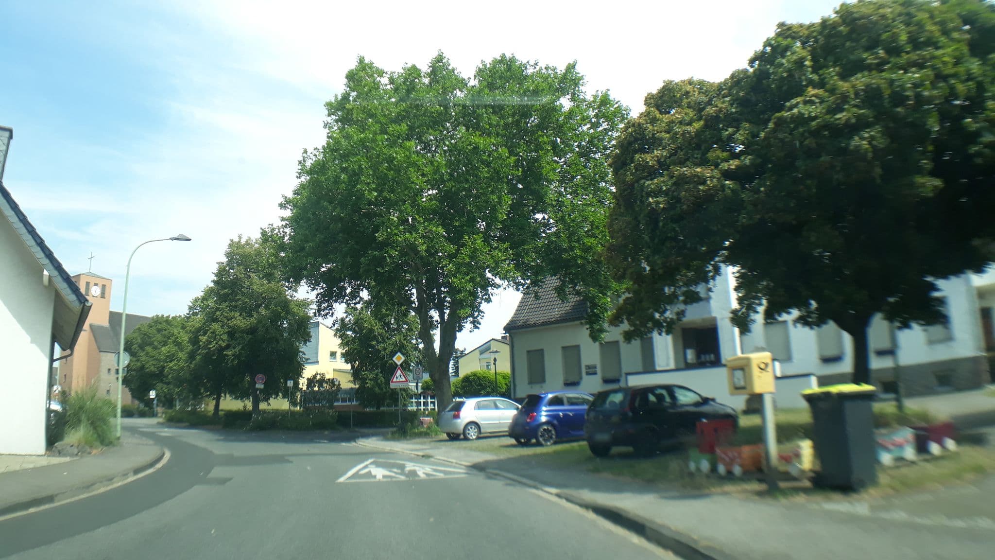 Street view near Gemeinde Inden Jugendheim Quovadis, Inden — © tobiasreg (CC BY-SA · Mapillary)