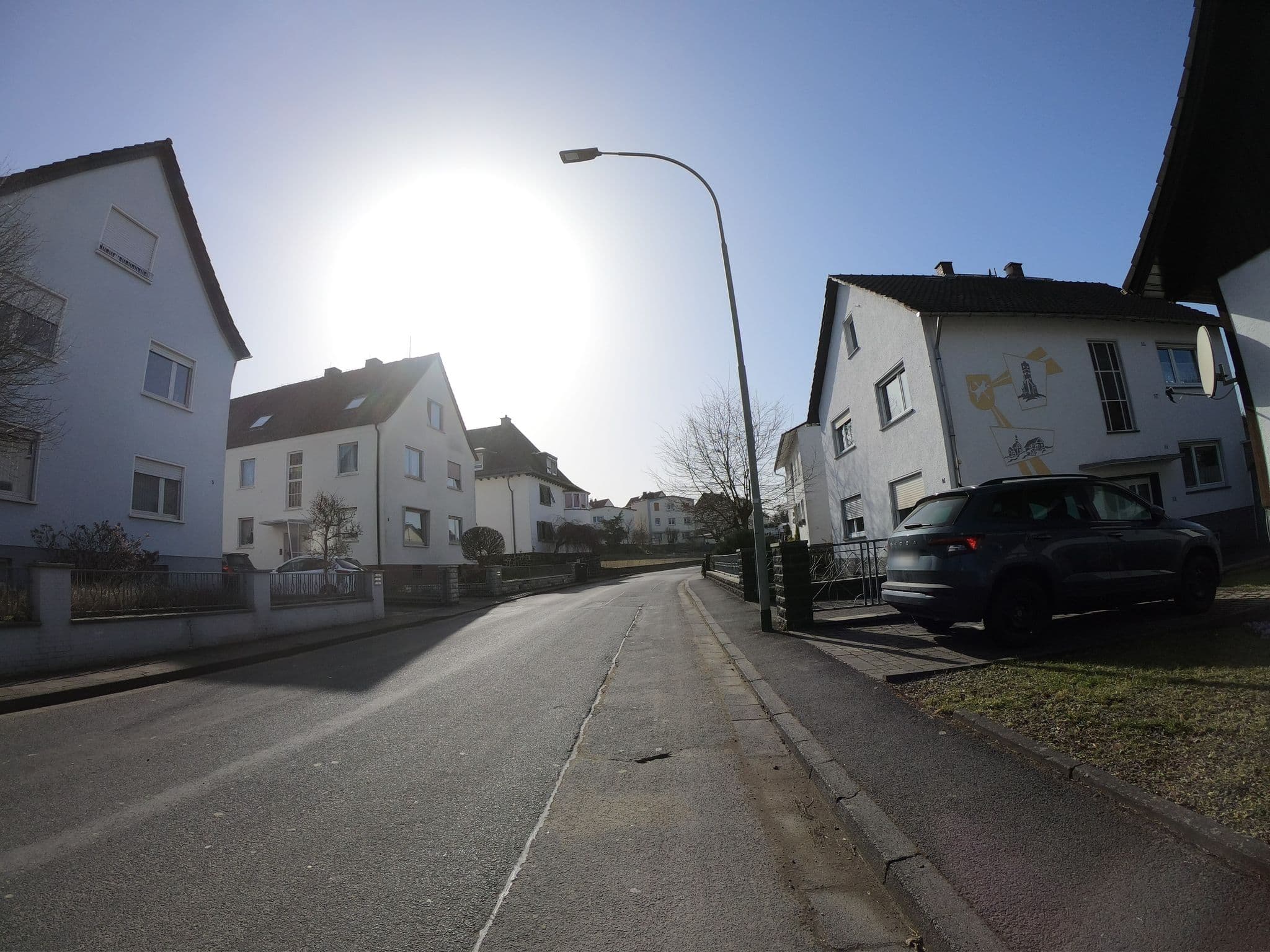 Street view near Hotel Zum kühlen Grund, Langgöns — © grinninghamster (CC BY-SA · Mapillary)