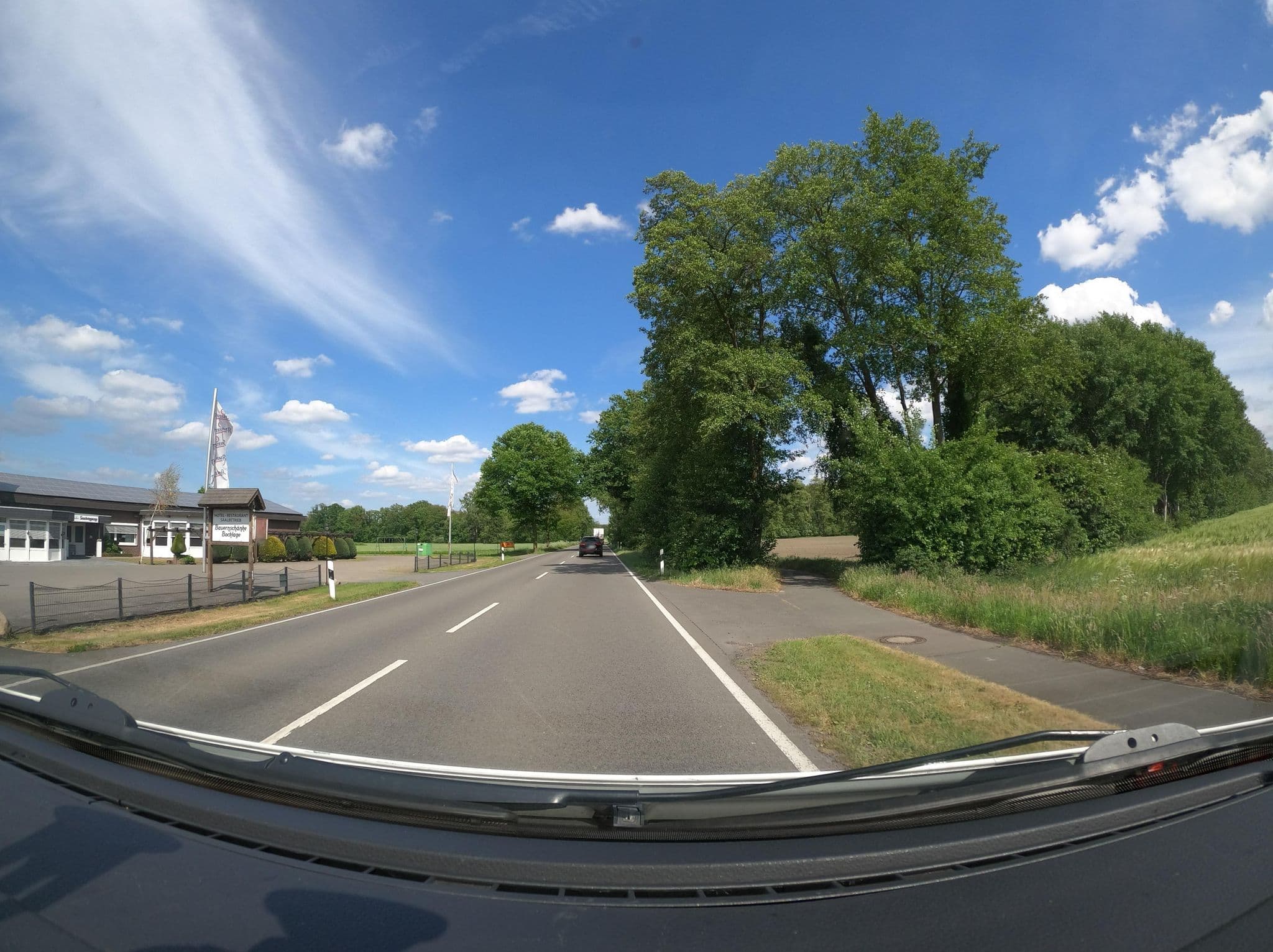 Street view near Bauernschänke/Landhotel Bocklagw, Holdorf — © Langfahrer (CC BY-SA · Mapillary)