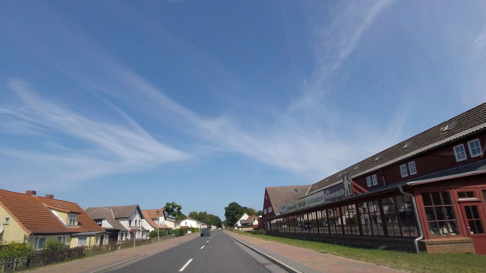 Street view near Rügen - ABC Ferienwohnungsvermittlung, Rambin — © fdmap (CC BY-SA · Mapillary)
