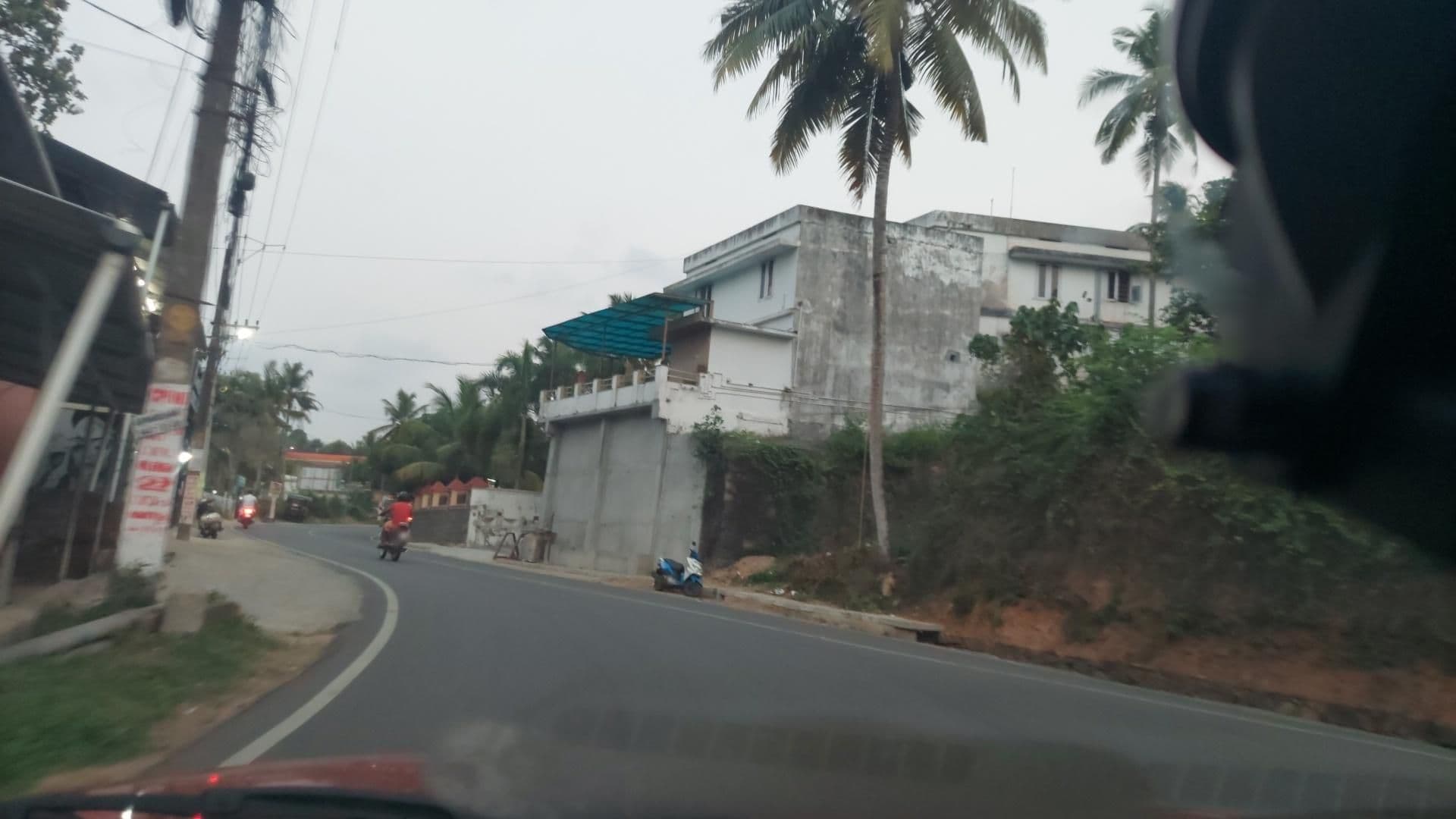 Street view near Thapovan Ayurvedic Centre, Kovalam — © roadroid (CC BY-SA · Mapillary)