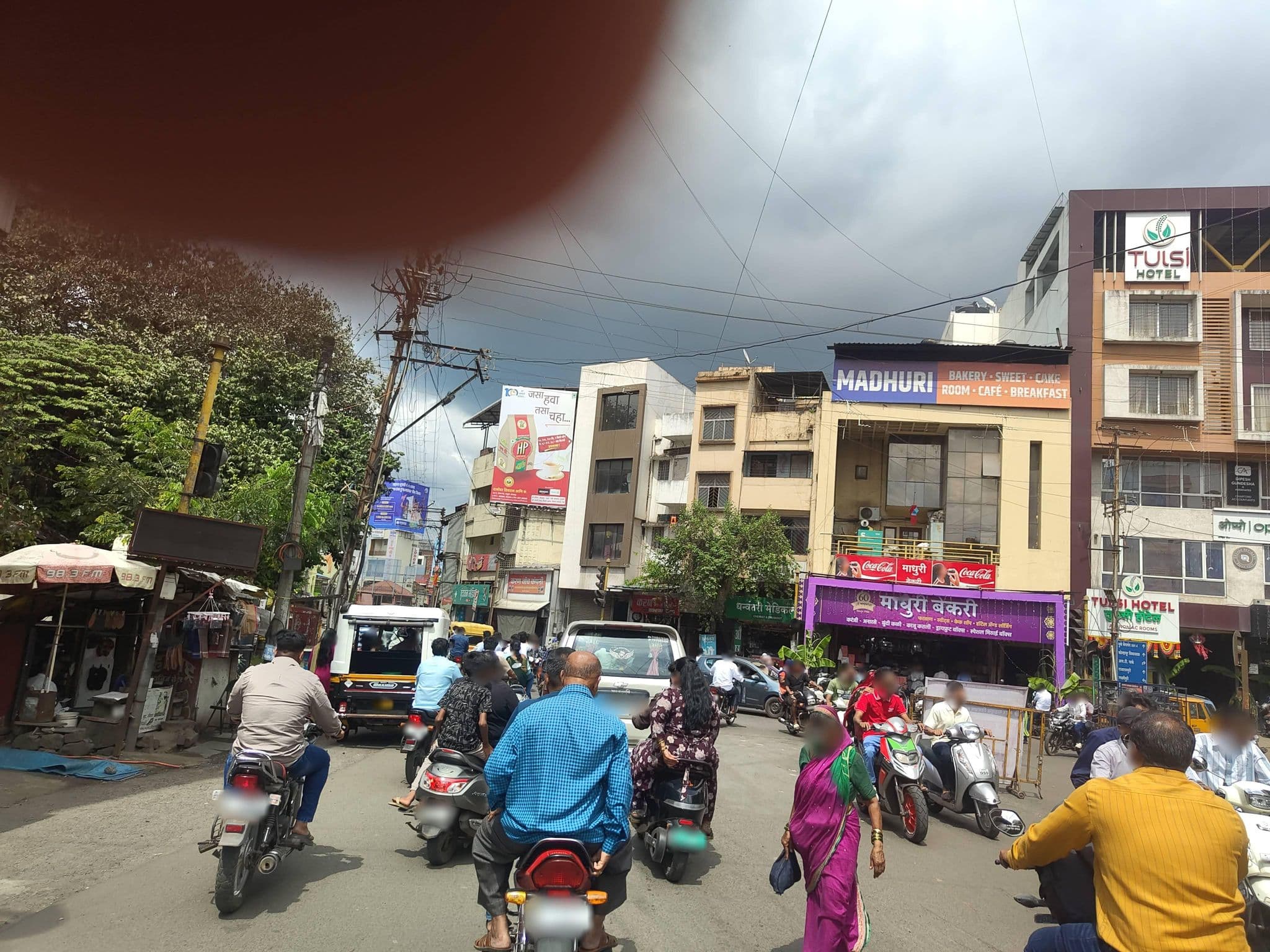 Street view near Hotel Tulsi, Kolhāpur — © Pranav_2001 (CC BY-SA · Mapillary)