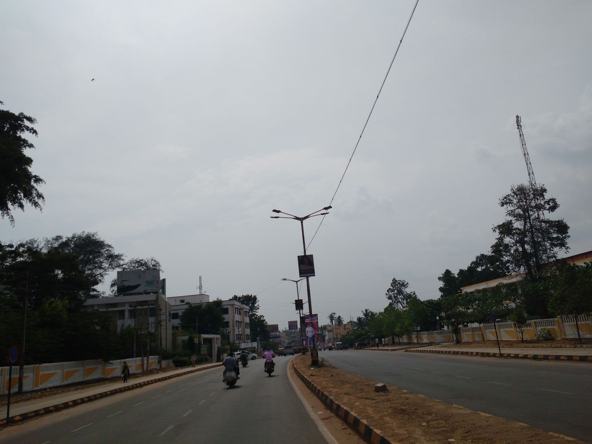 Street view near Hotel Lakshmi Channakeshava, Hassan — © srividya (CC BY-SA · Mapillary)