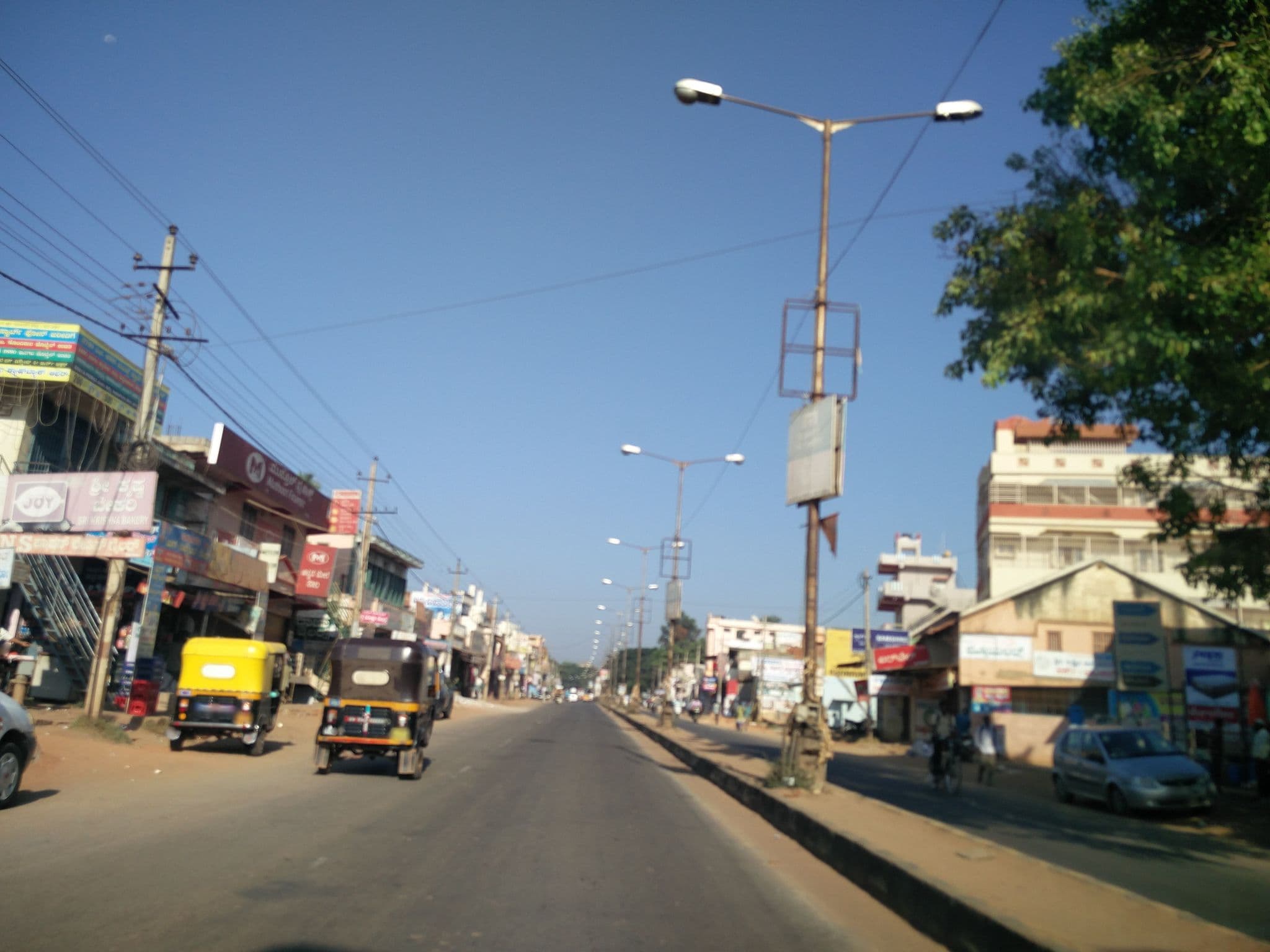 Street view near Aralimara Hotel, Gubbi — © jothirnadh (CC BY-SA · Mapillary)