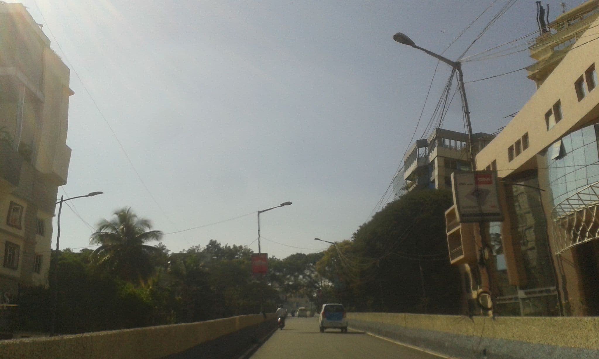 Street view near The Richmond Hotel Bangalore, Bengaluru — © yogi (CC BY-SA · Mapillary)