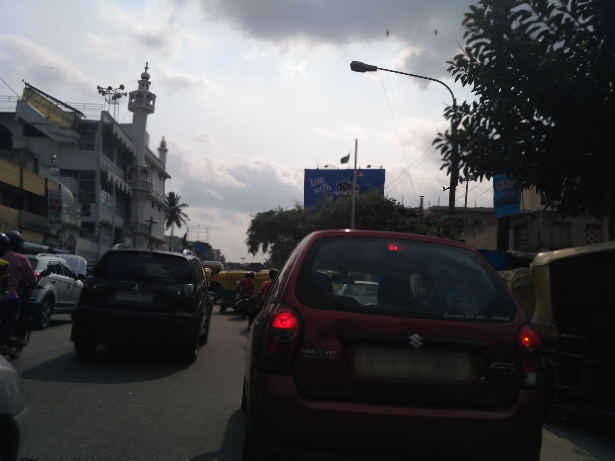 Street view near Bg Jilla Hotel Karmikara Sangha, Bengaluru — © chethan (CC BY-SA · Mapillary)