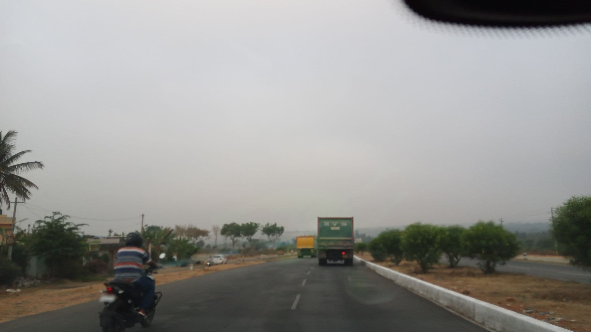 Street view near Smr Hotel, Nelamangala — © pradeepbv (CC BY-SA · Mapillary)