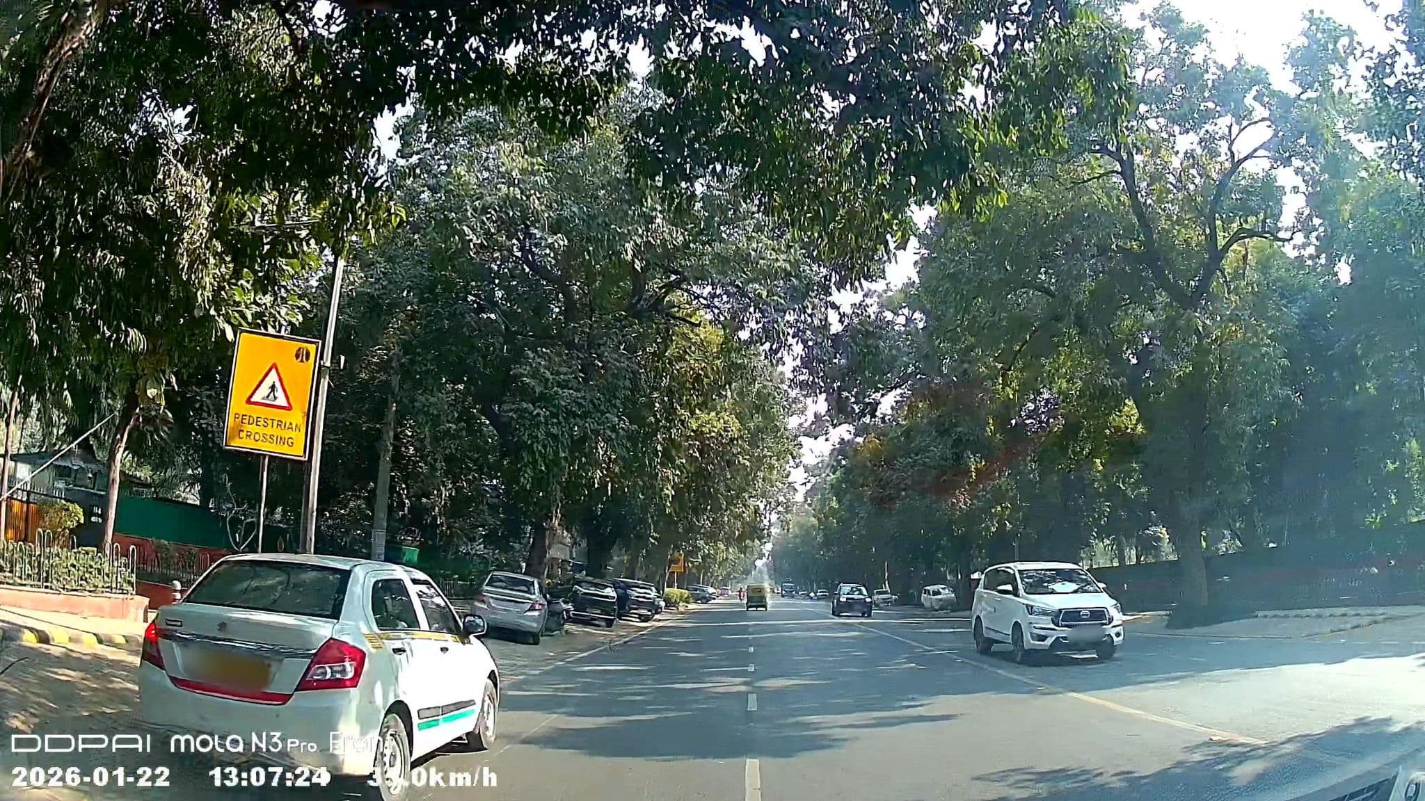 Street view near Woodpecker Apartments, New Delhi — © Ibigrp (CC BY-SA · Mapillary)