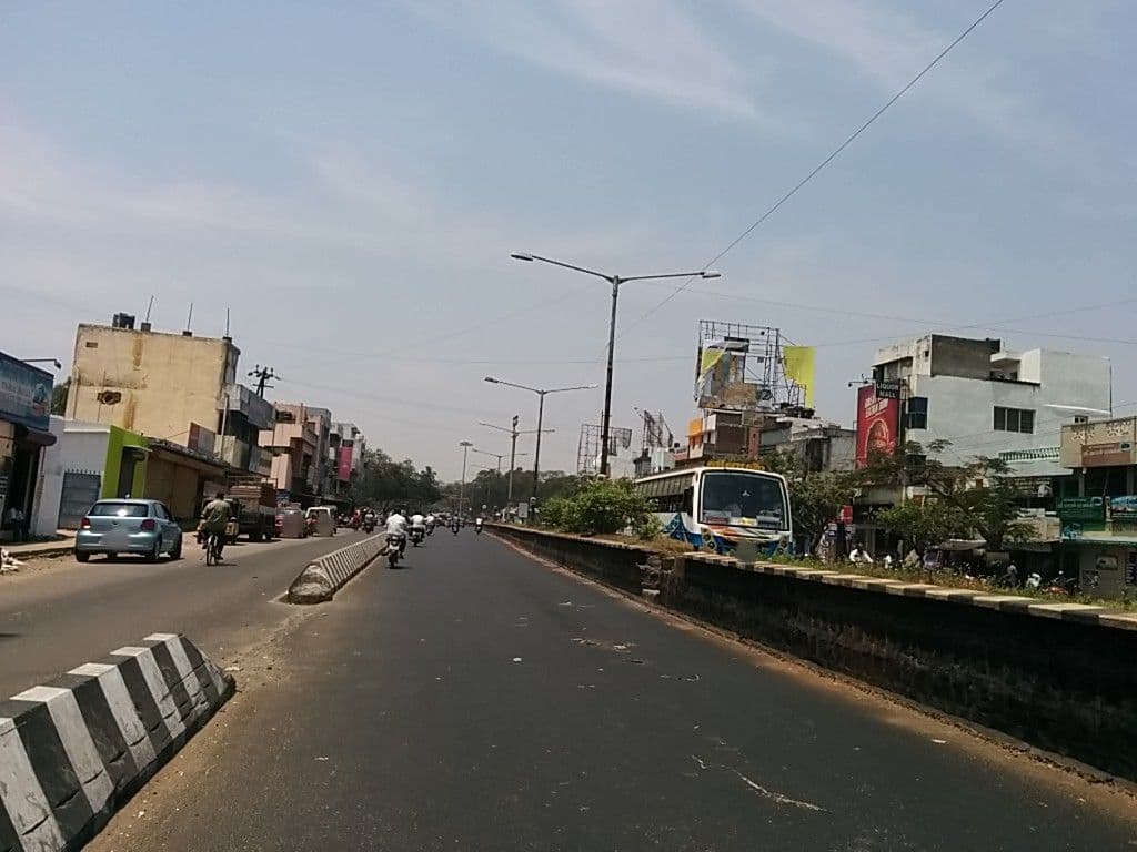 Street view near Abhirami Lodge, Gundupālaiyam — © sashazykov (CC BY-SA · Mapillary)