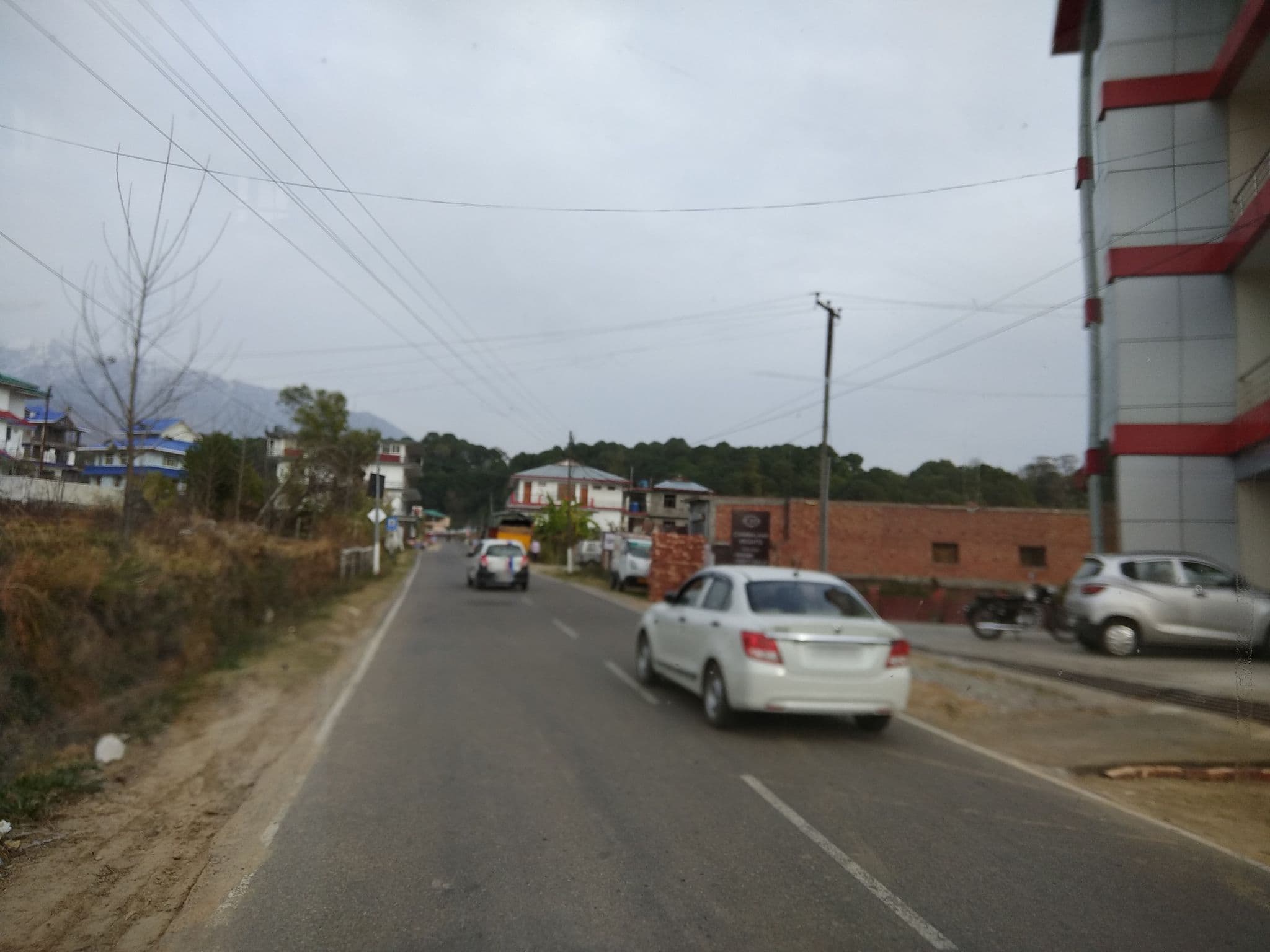Street view near Chimbalhar Heights, Pālampur — © bholekibhasam (CC BY-SA · Mapillary)