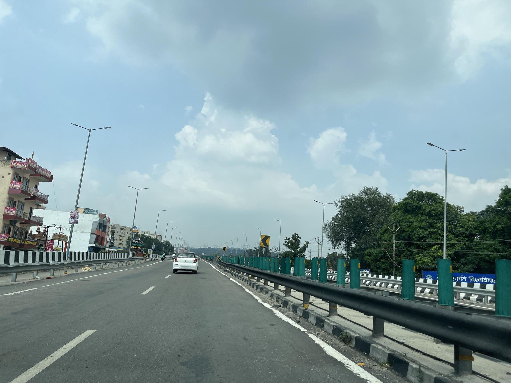 Street view near The Grand Basant, Rāīwāla Bara — © lakshyajeet (CC BY-SA · Mapillary)