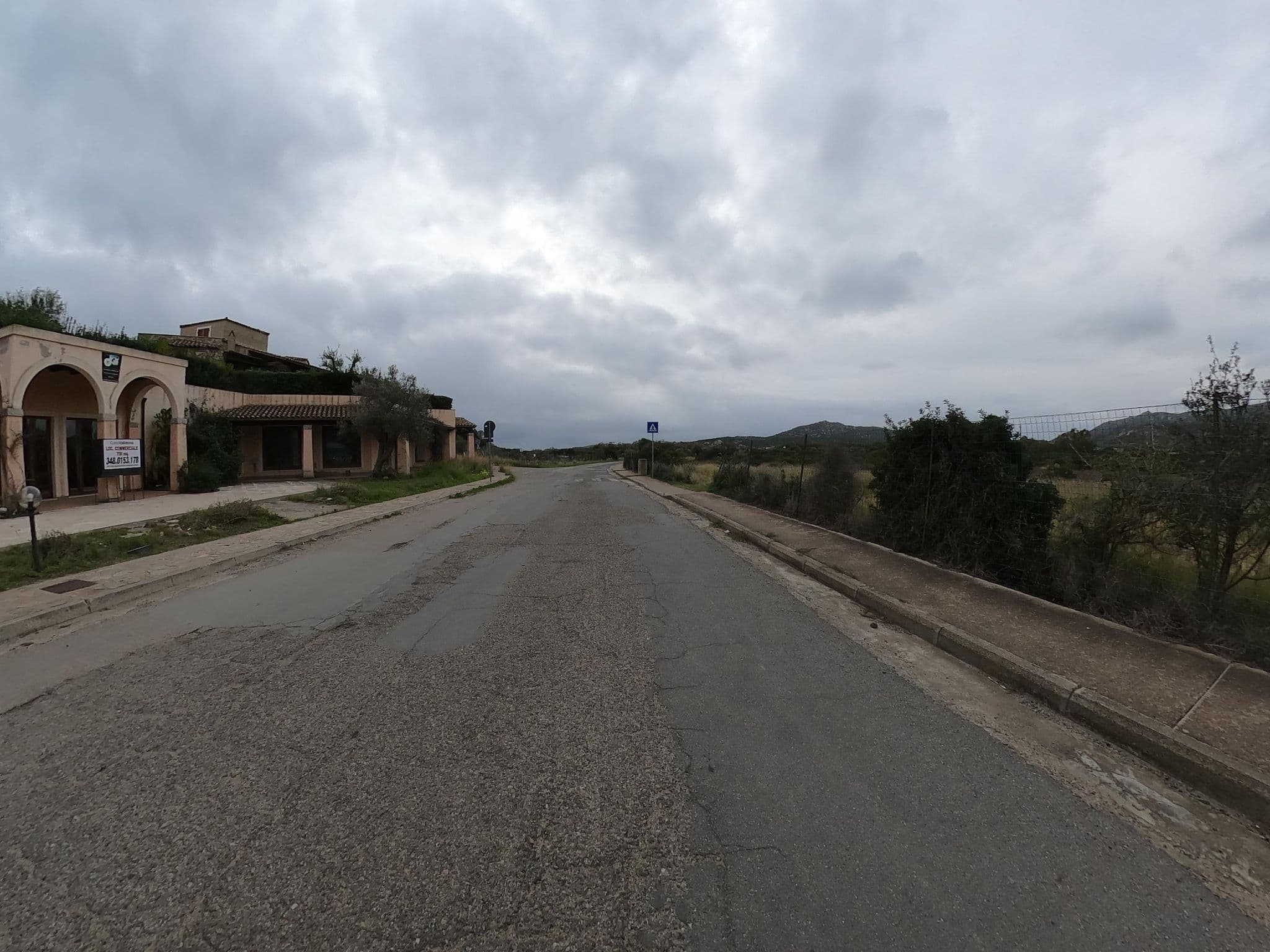 Street view near Baia di Chia Resort Sardinia, Curio Collection by Hilton, Domus de Maria — © joostjakob (CC BY-SA · Mapillary)