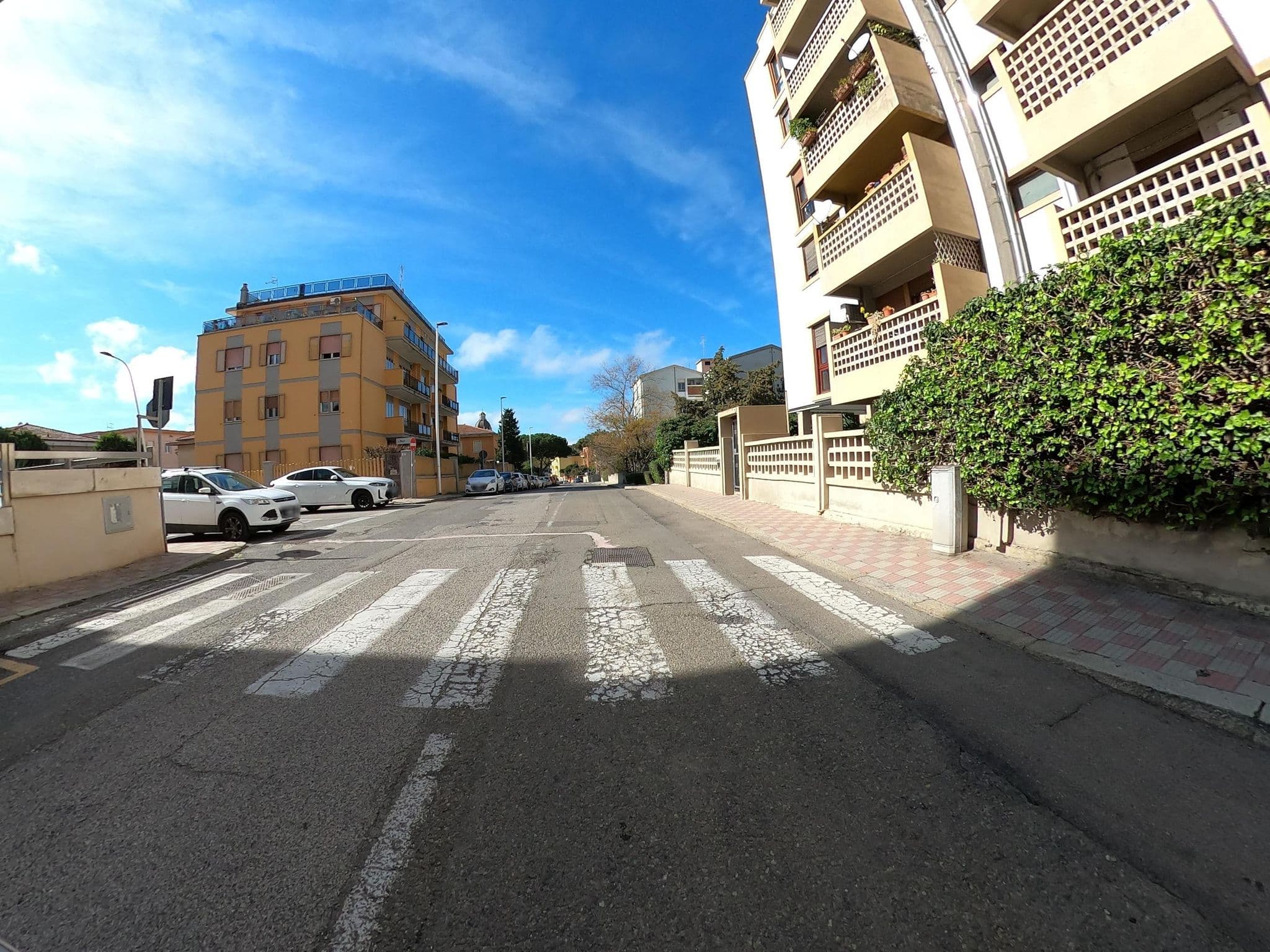 Street view near La Terrazza di Olimpia, Cagliari — © joostjakob (CC BY-SA · Mapillary)