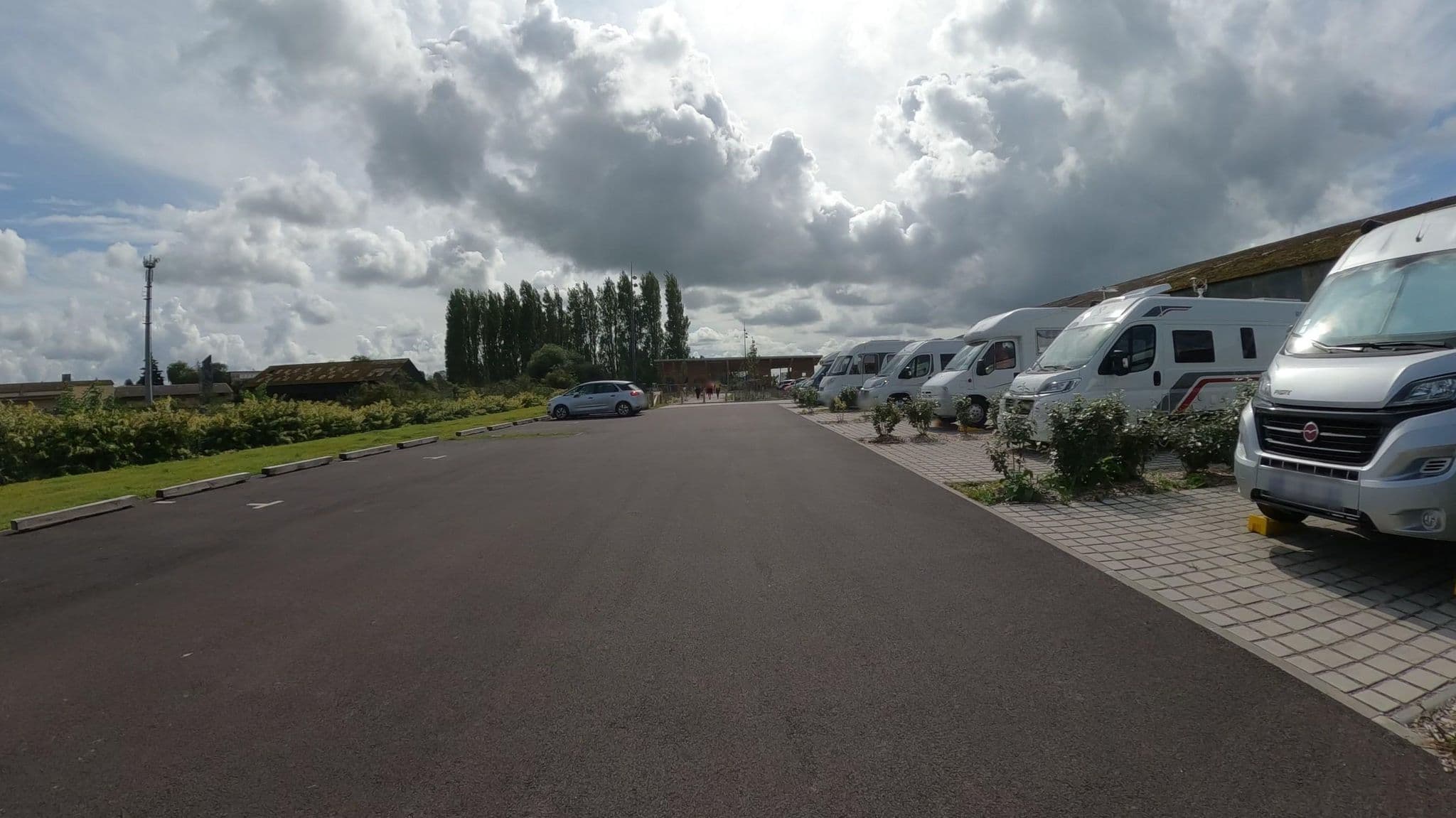 Street view near Aire de camping-cars communale d'Isigny-sur-Mer, Isigny-sur-Mer — © Nzau (CC BY-SA · Mapillary)