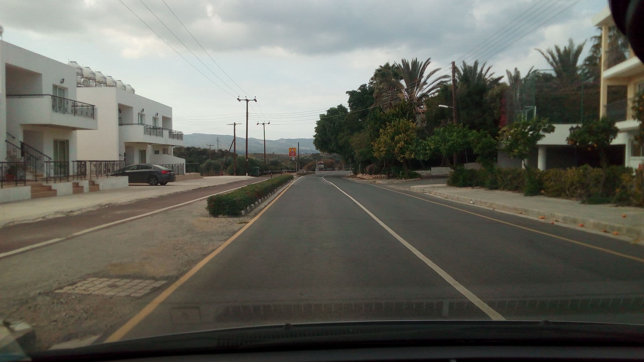 Street view near Nicki Holiday Resort, Pólis — © stpkyriakou (CC BY-SA · Mapillary)