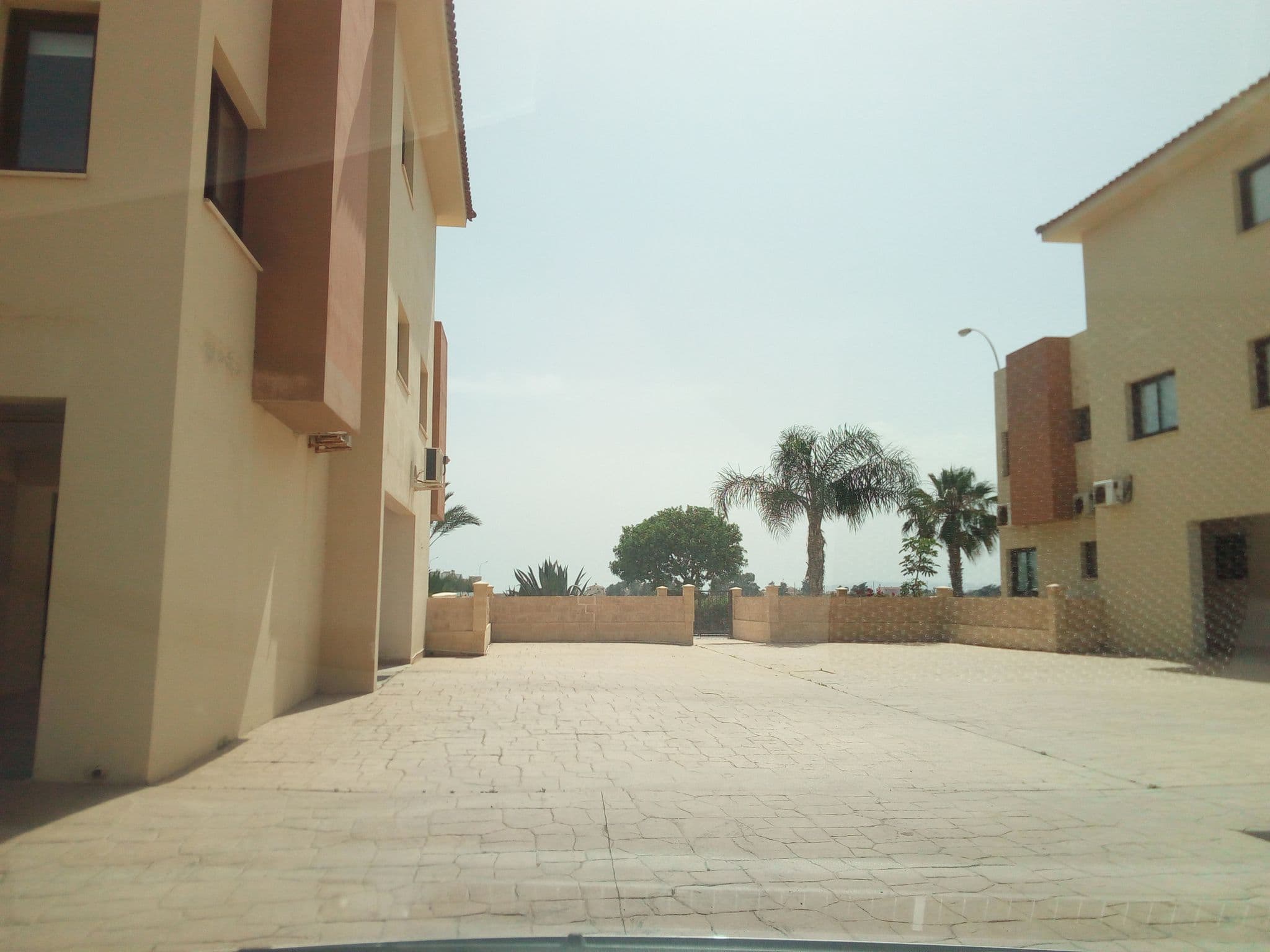 Street view near Possidon block, Perivólia — © stpkyriakou (CC BY-SA · Mapillary)