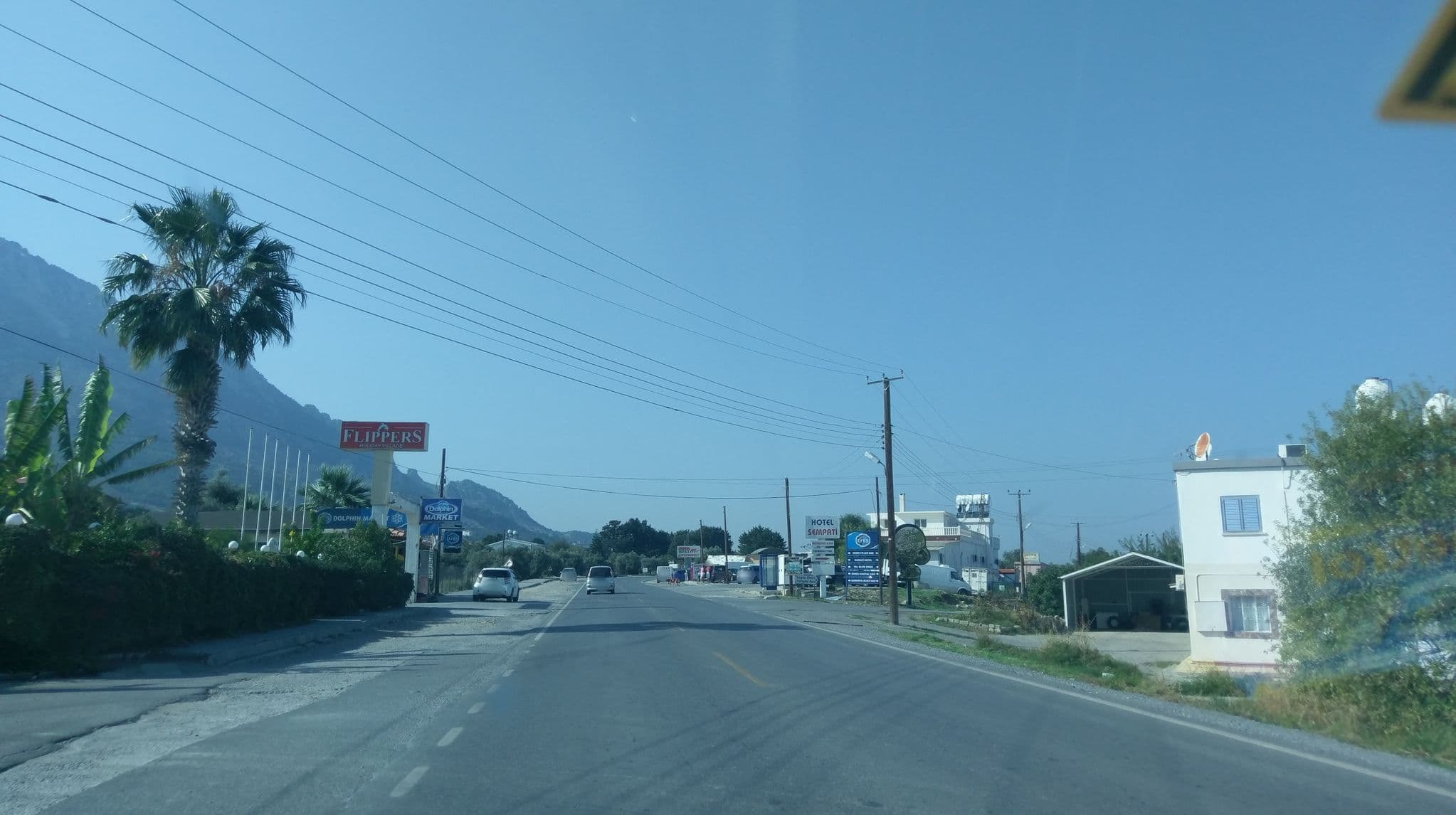 Street view near Flippers, Lápithos — © ozkanilyasaksu (CC BY-SA · Mapillary)