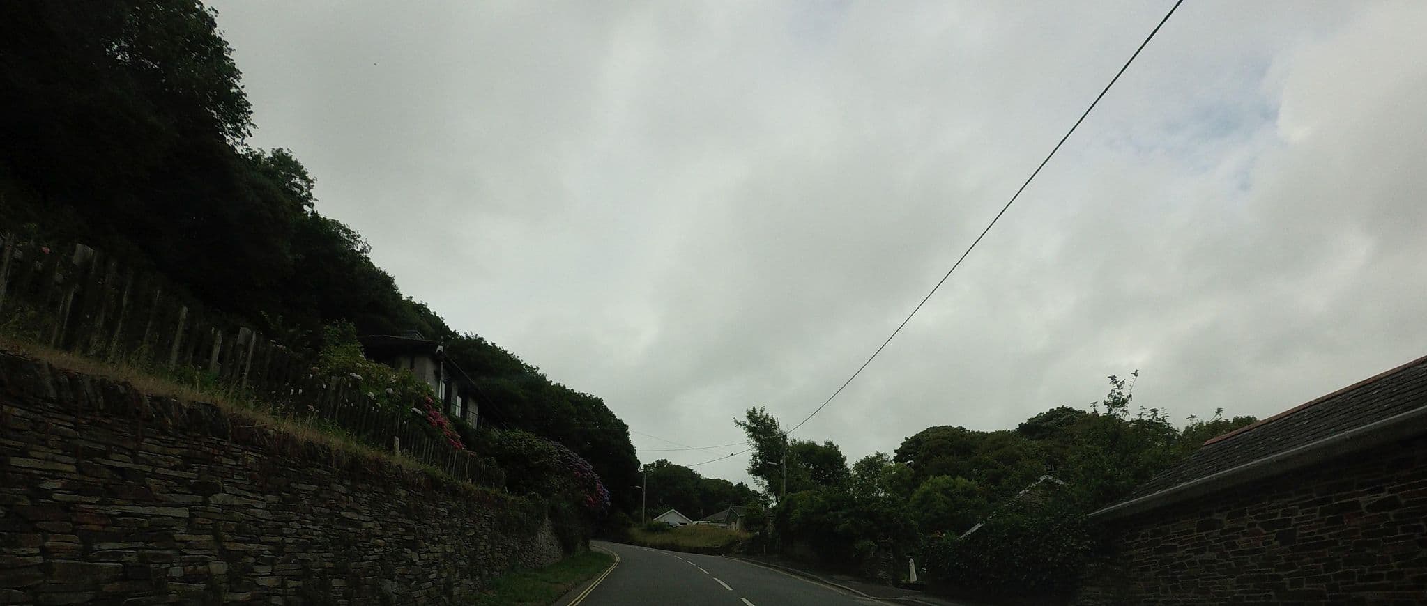 Street view near Lower Meadows House B&B, Tintagel — © hobgoblin (CC BY-SA · Mapillary)