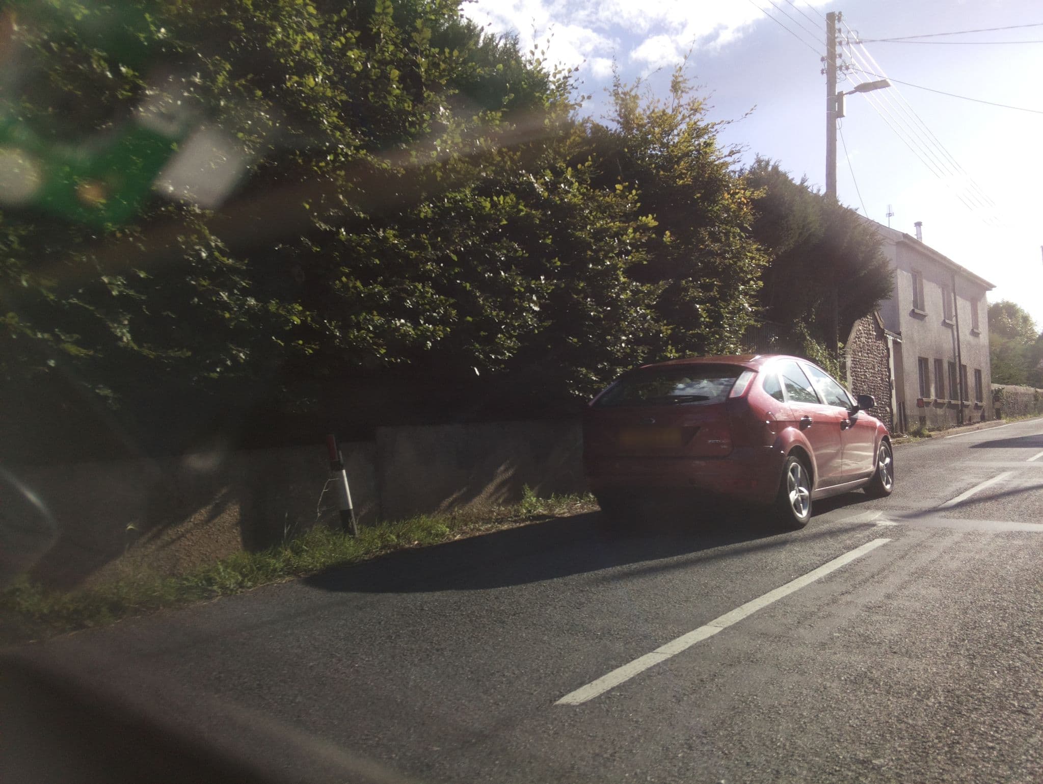 Street view near Southern Cross Guesthouse, Newton Poppleford — © southglos (CC BY-SA · Mapillary)