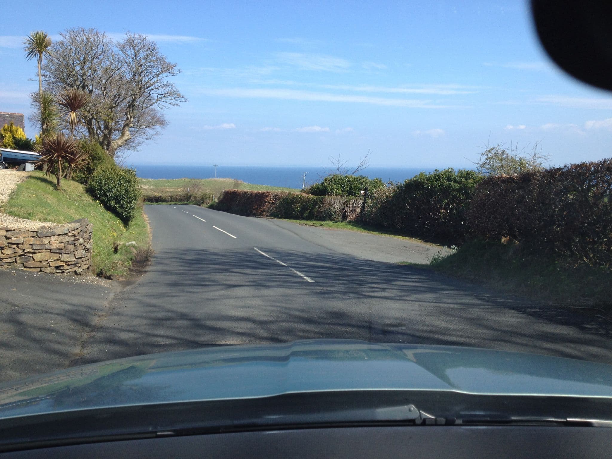 Street view near Woodley Cottage 2, Lamlash — © hobgoblin (CC BY-SA · Mapillary)