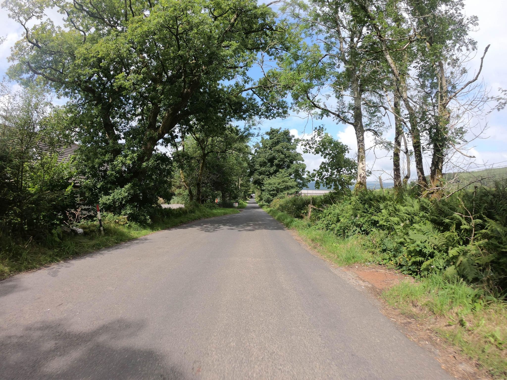 Street view near Bluebell Cottage, Tarbert — © joostjakob (CC BY-SA · Mapillary)