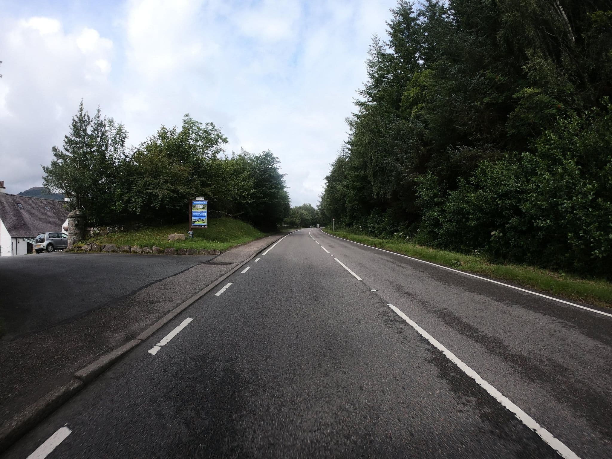 Street view near Grianan House Bed and Breakfast, Caol — © joostjakob (CC BY-SA · Mapillary)