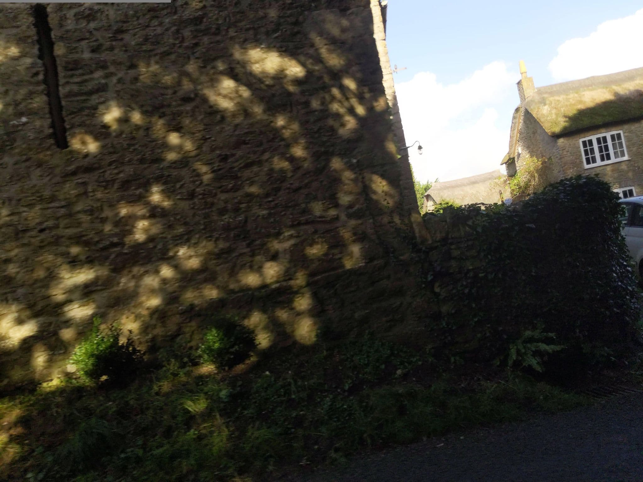 Street view near Carters Cottage, West Bay — © WaggyDog (CC BY-SA · Mapillary)