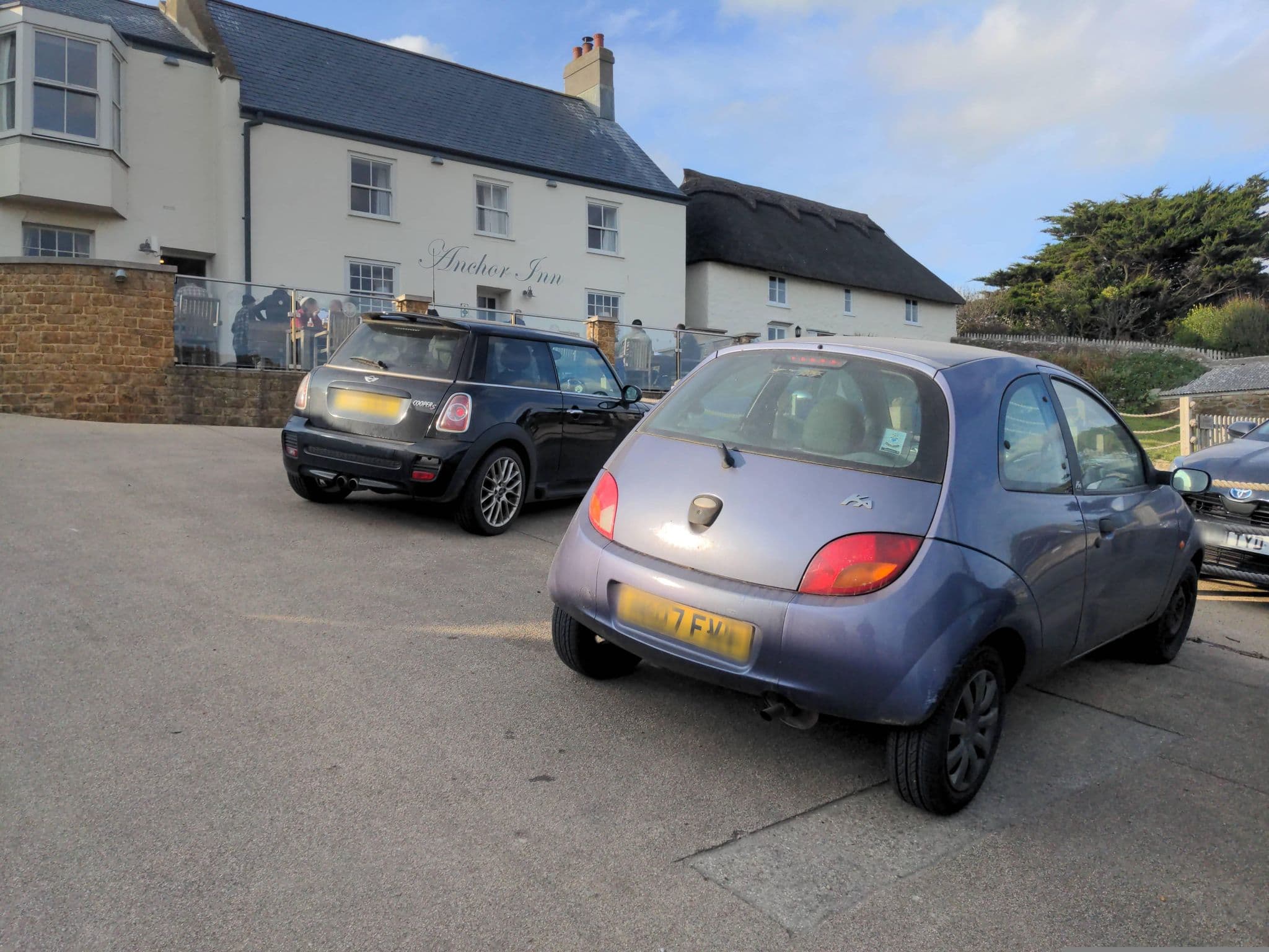 Street view near The Anchor Inn, West Bay — © WaggyDog (CC BY-SA · Mapillary)
