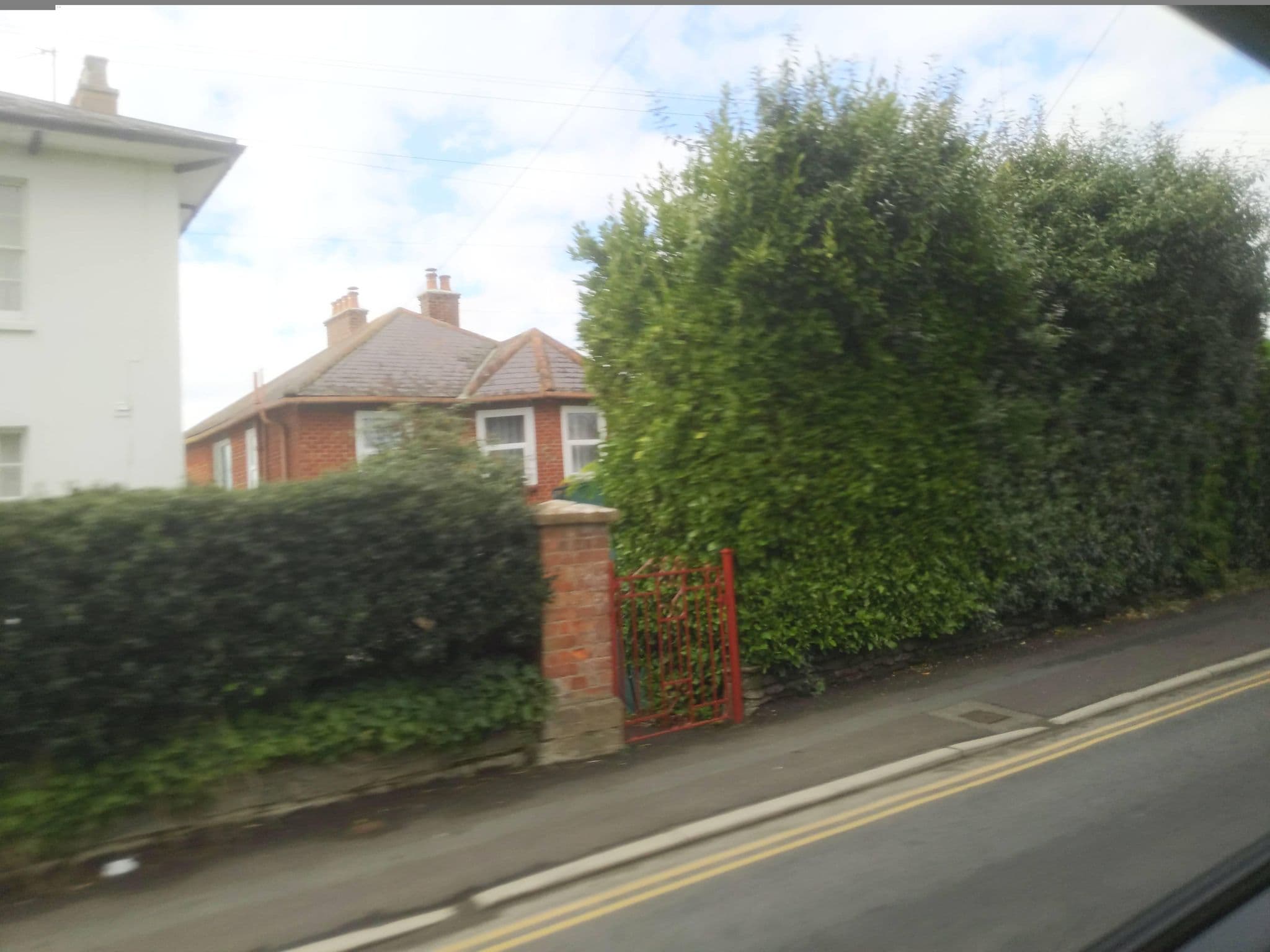 Street view near The White House, West Bay — © WaggyDog (CC BY-SA · Mapillary)