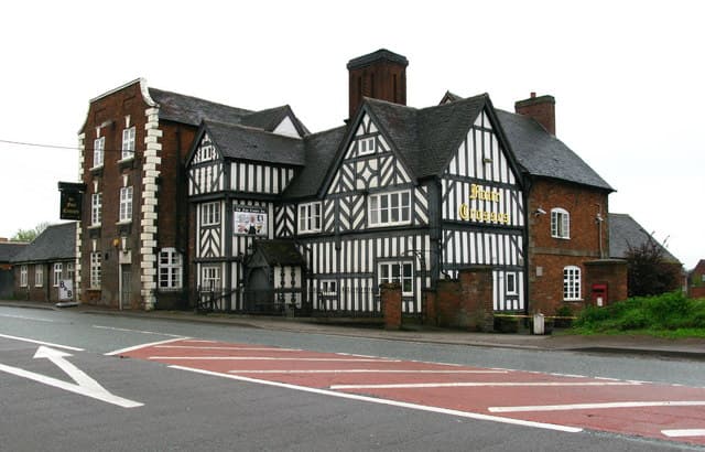 Four Crosses (via Wikimedia Commons, CC BY-SA 2.0)