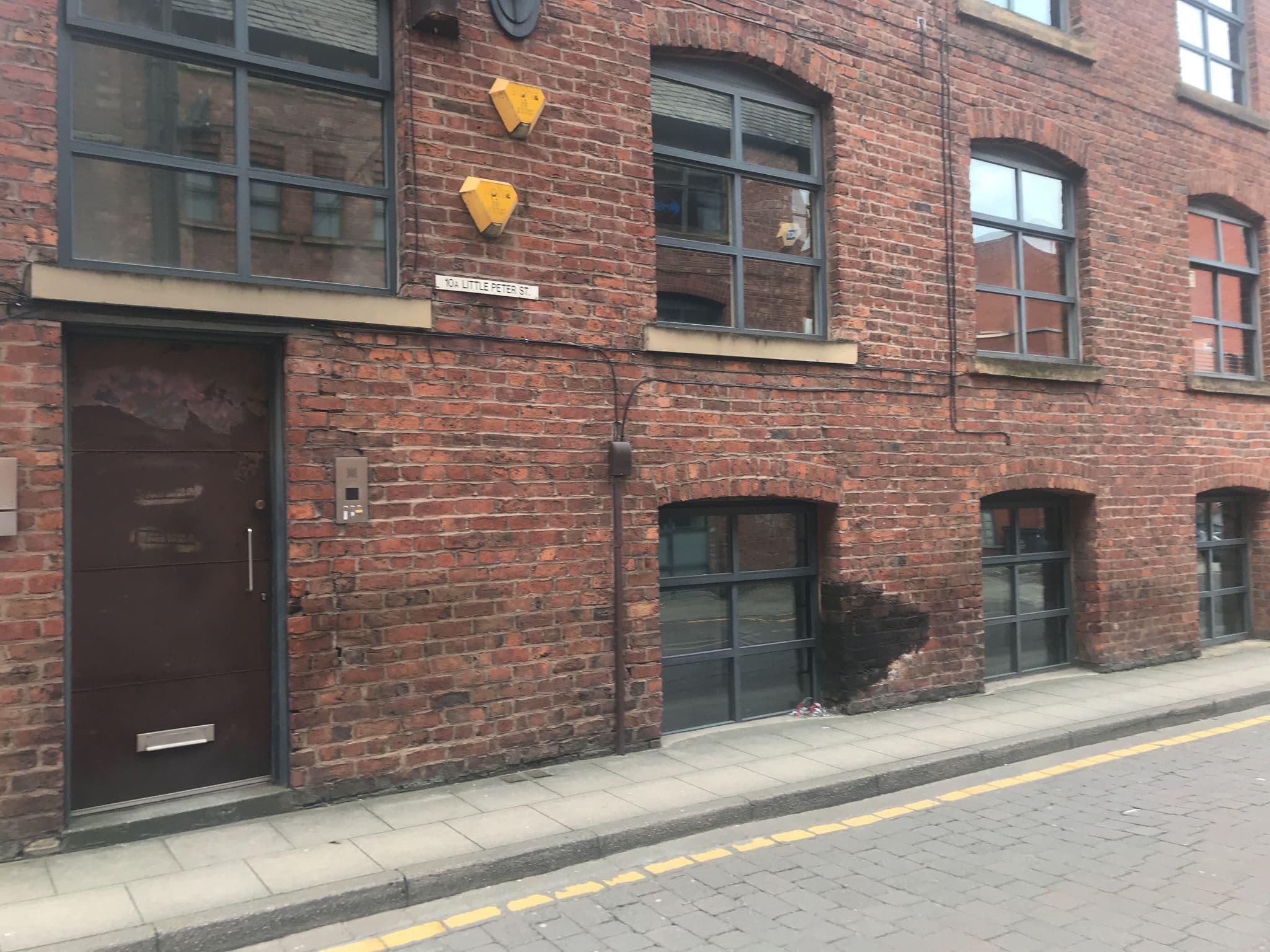Street view near Iida Apartments, Hulme — © l_v_campton (CC BY-SA · Mapillary)