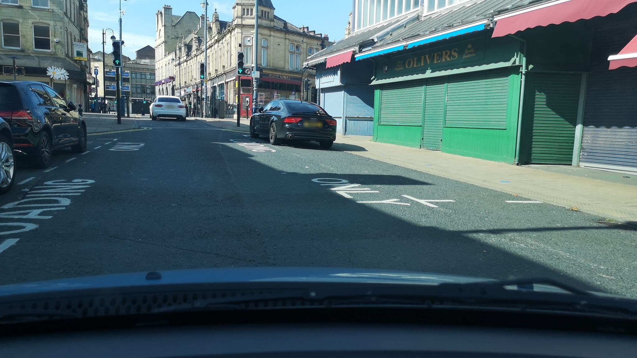 Street view near Town Centre Apartments, Dewsbury — © cuttlebug (CC BY-SA · Mapillary)