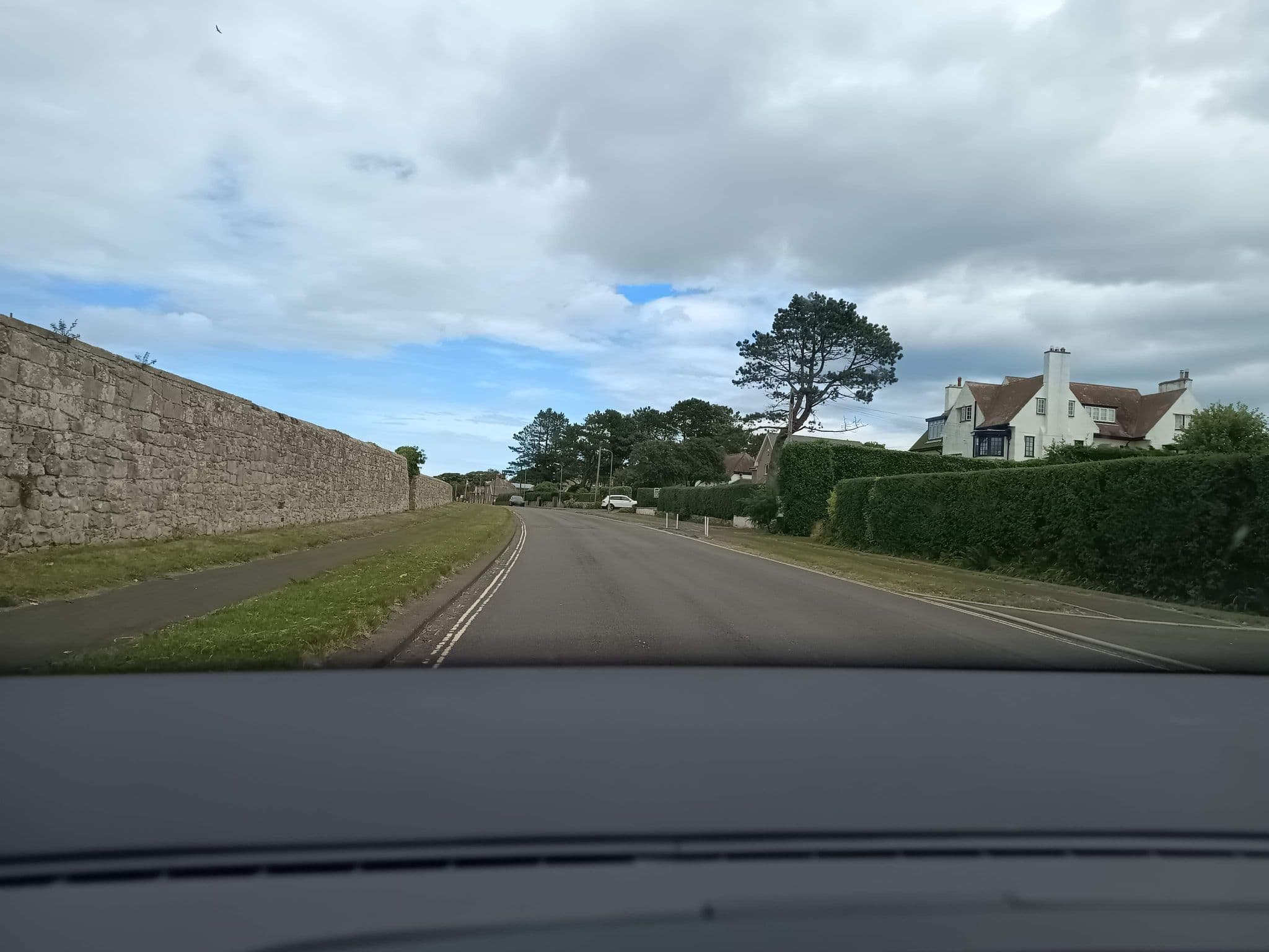Street view near Glebe House & Cottage, North Sunderland — © zuse (CC BY-SA · Mapillary)