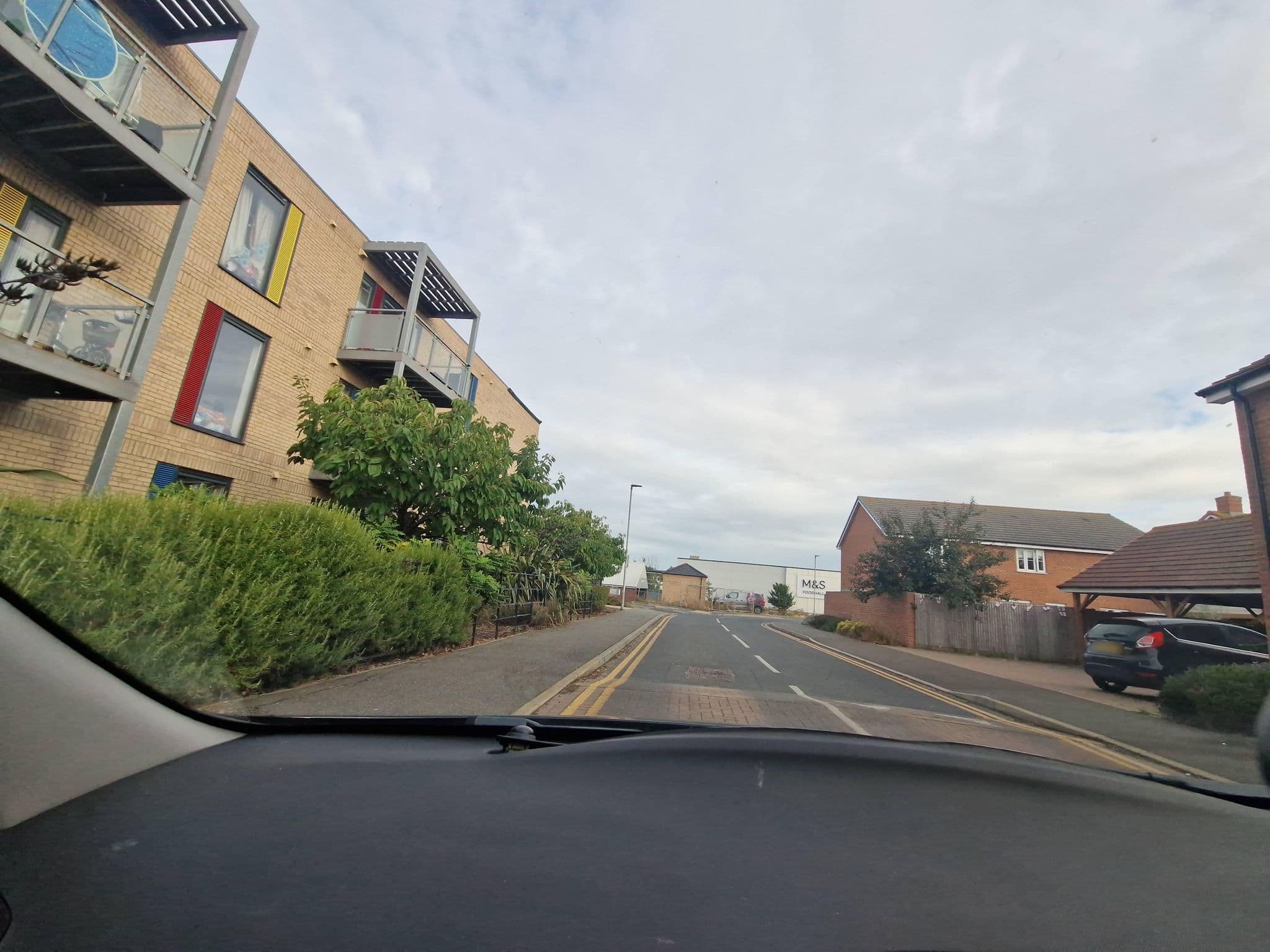 Street view near Martello Caravan Park, Walton-on-the-Naze — © edloach (CC BY-SA · Mapillary)