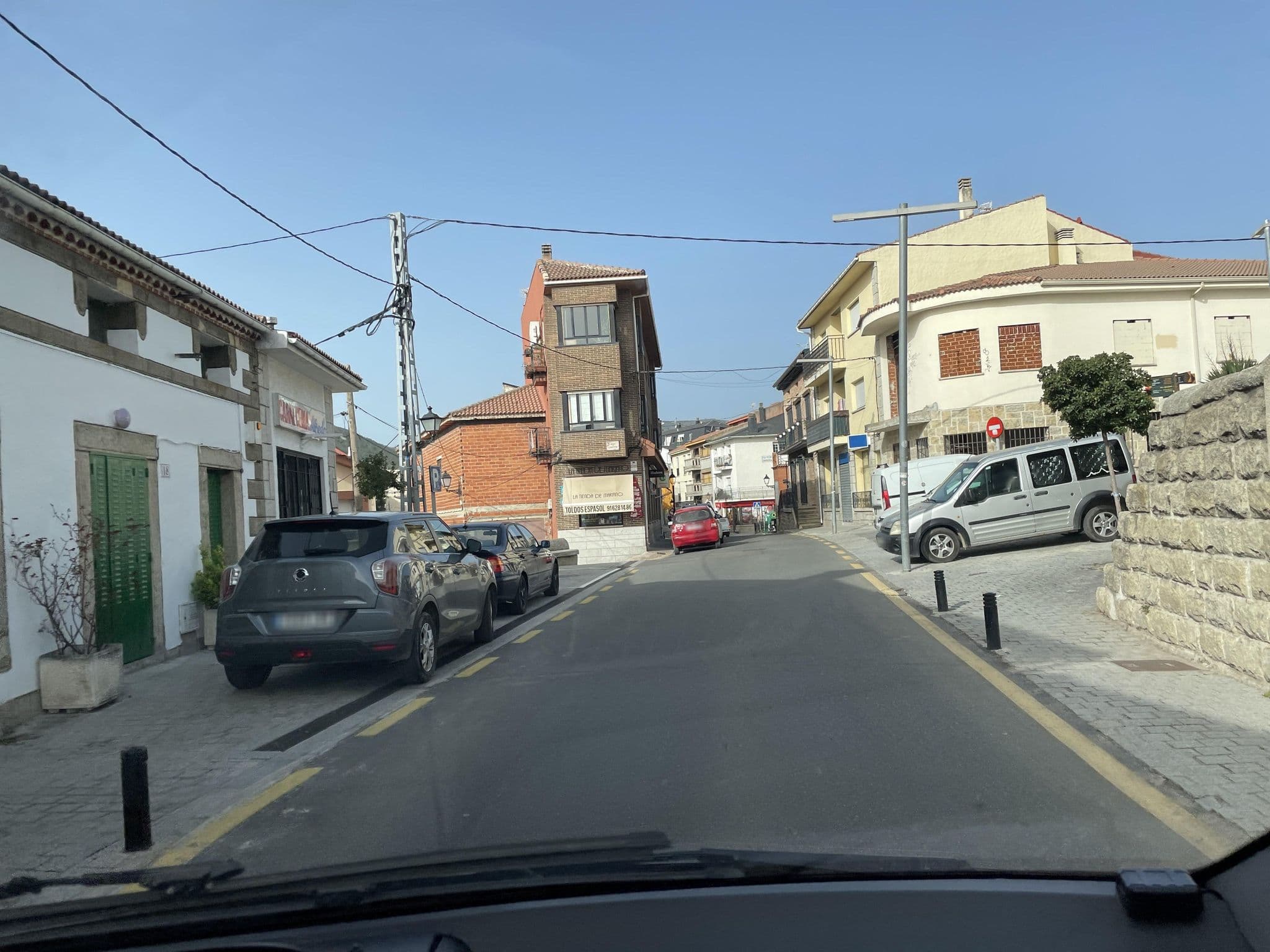 Street view near Albergue del Valle de los Abedules, Bustarviejo — © seraq (CC BY-SA · Mapillary)