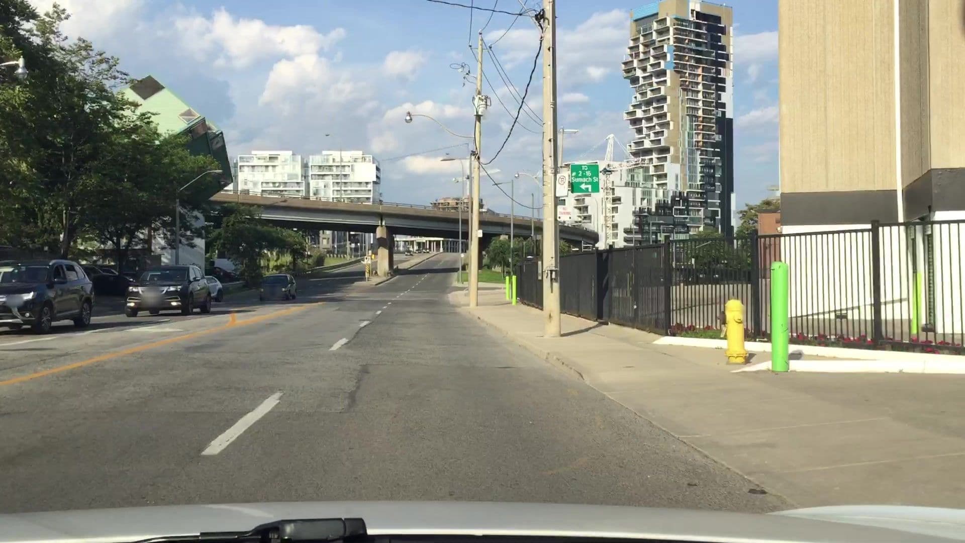Street view near Corktown Cottages, Regent Park — © lvl5 (CC BY-SA · Mapillary)