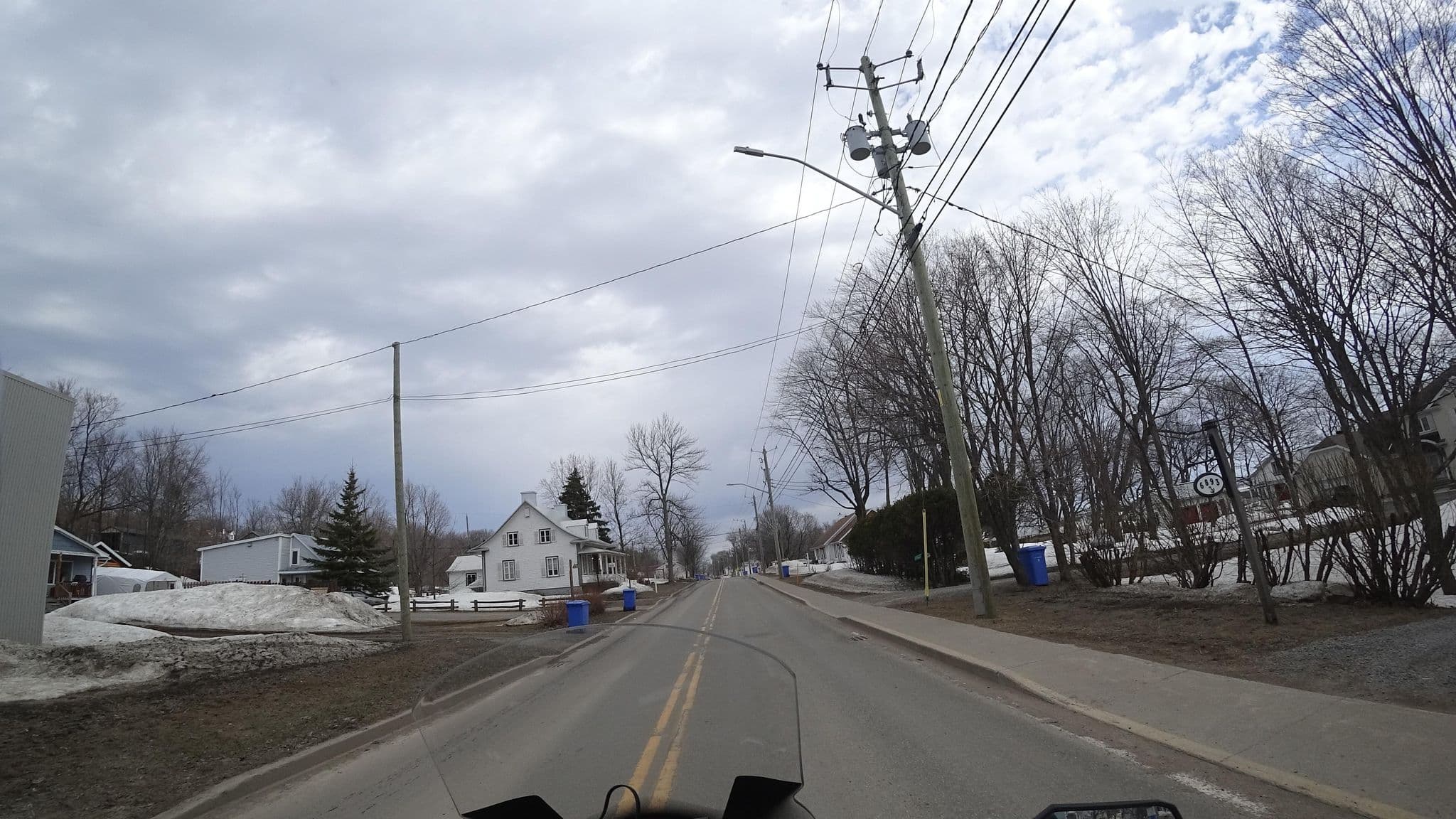 Street view near Villa Au bord de l'eau, L'Ange-Gardien — © michelcouturemotomcm (CC BY-SA · Mapillary)