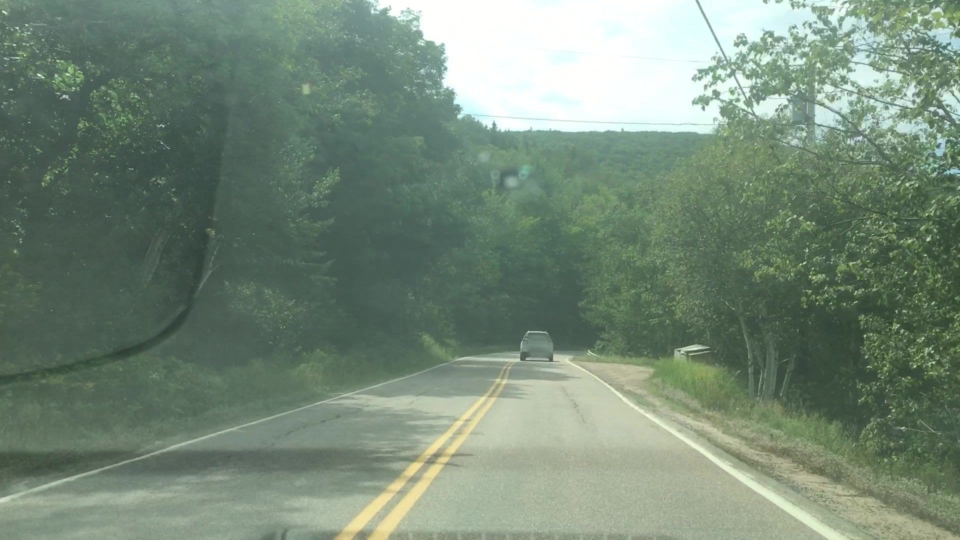 Street view near Knotty Pine Cottages, Ingonish — © lvl5 (CC BY-SA · Mapillary)