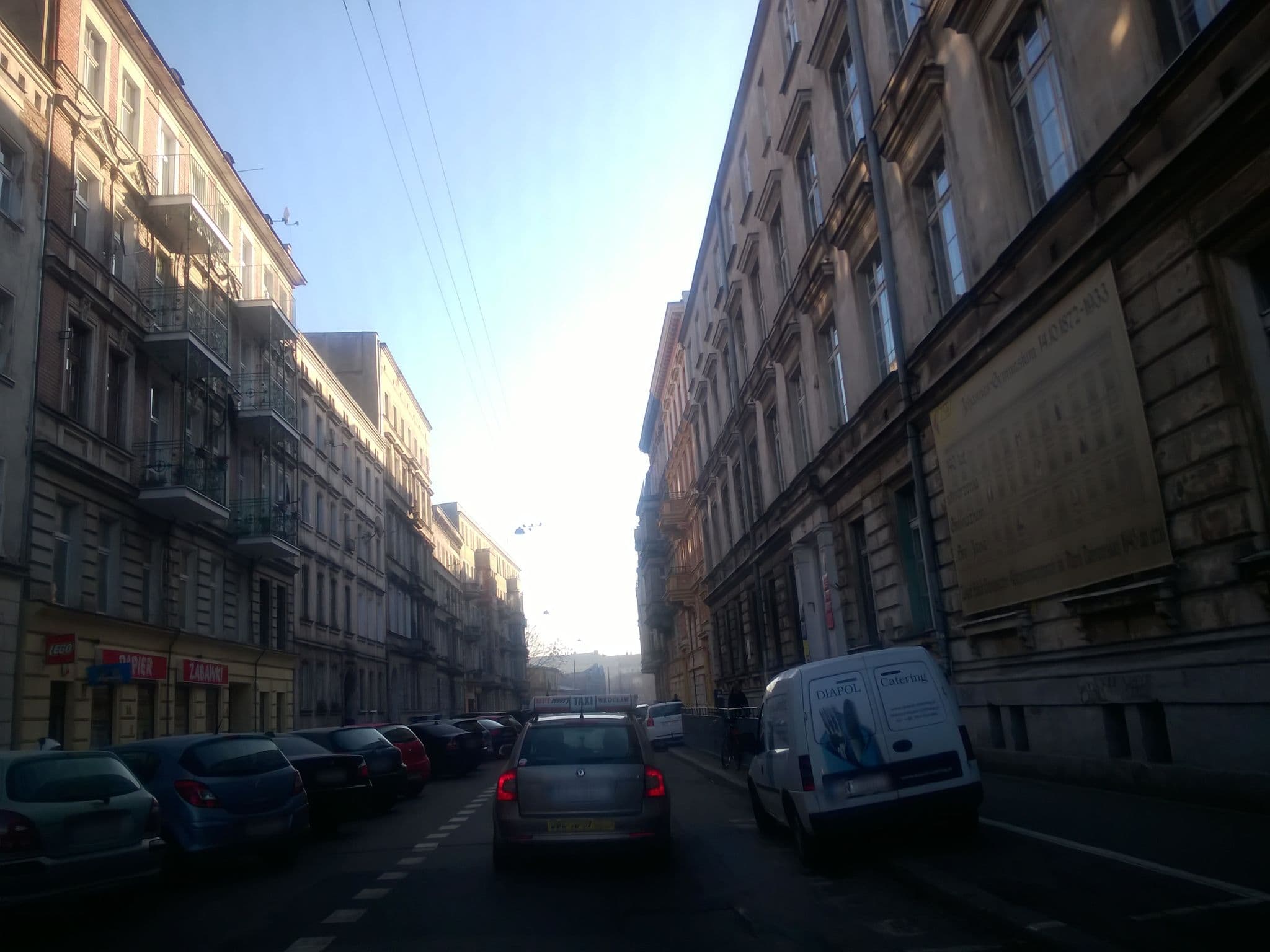 Street view near Grey Apartments, Rejon ulicy Traugutta — © misiekwr (CC BY-SA · Mapillary)
