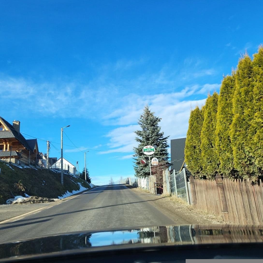 Street view near Skupień Józefa Wynajem Pokoi Gościnnych, Bukowina Tatrzańska — © picturehoover (CC BY-SA · Mapillary)